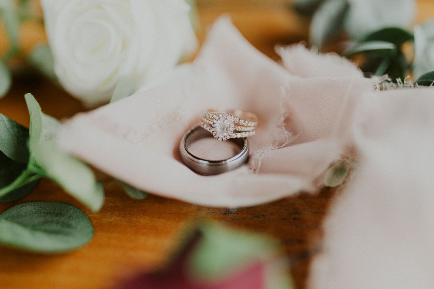 A detailed photo of the bride and grooms rings.