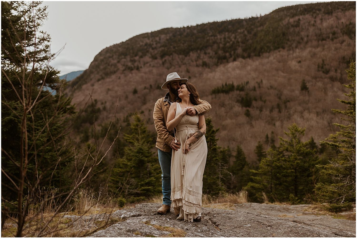 NH couple taking engagement photos in the White Mountains