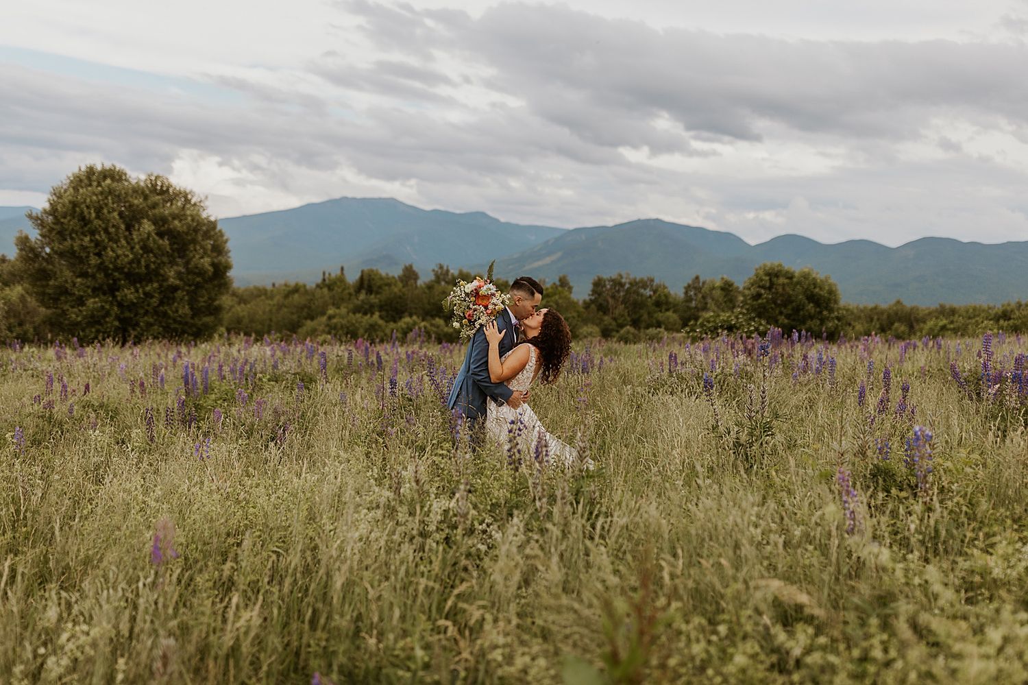 Bride and groom at their Sugar Hill micro wedding in NH, taken by Robin Easler Photography