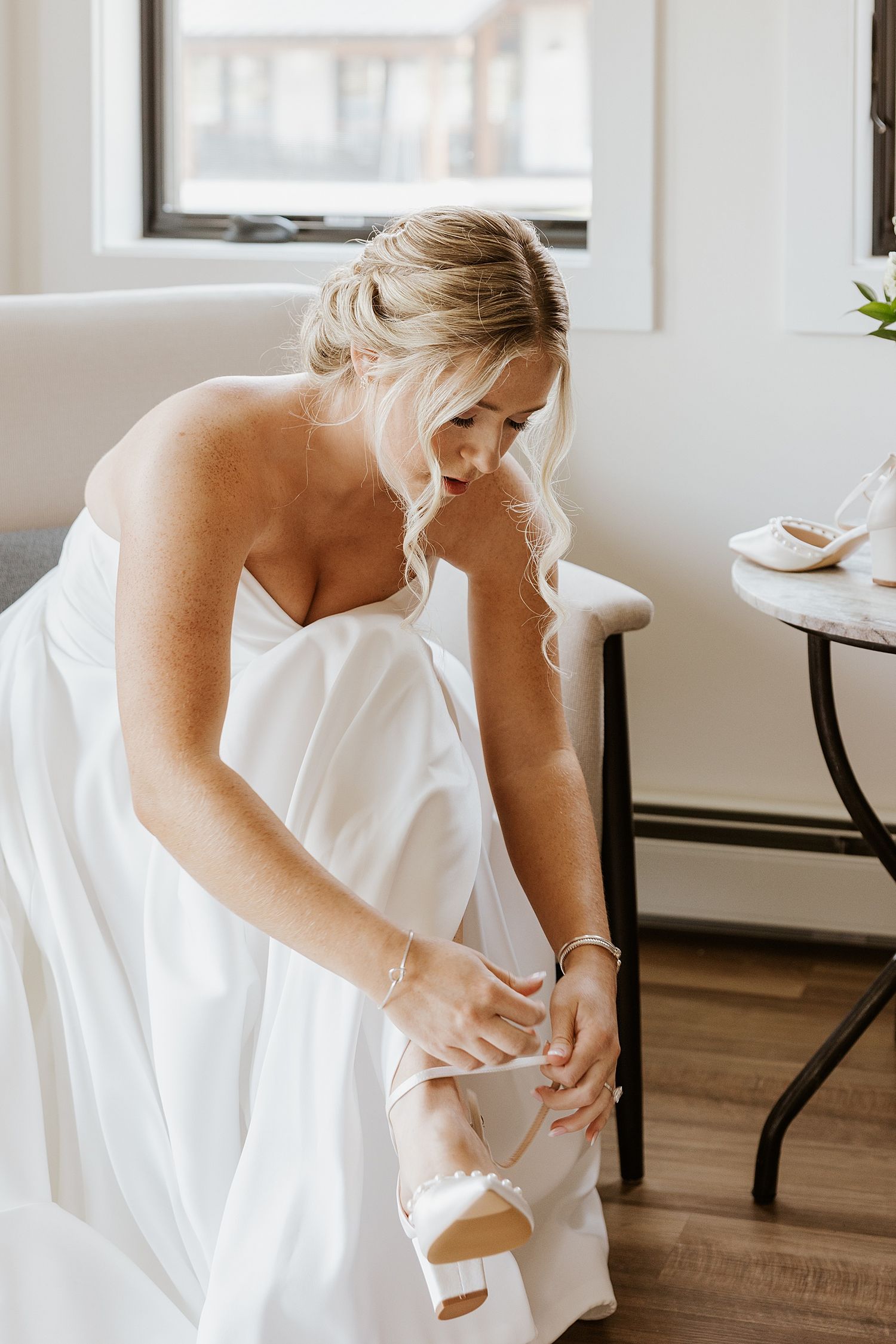 Bride getting ready for her Owl's Nest Resort wedding in NH