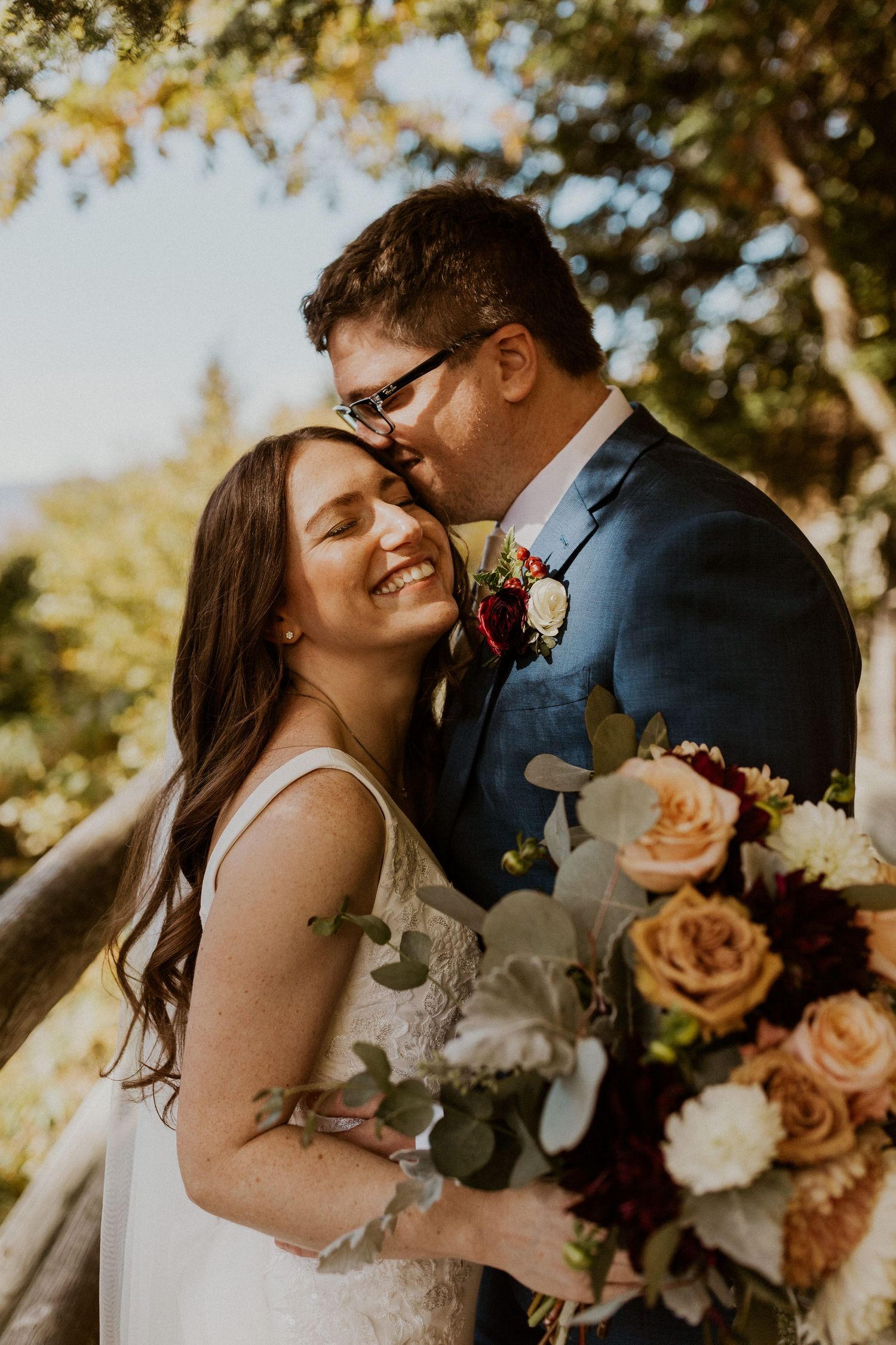 Portraits of the newlyweds on top of Loon Mountain after their fall wedding ceremony.