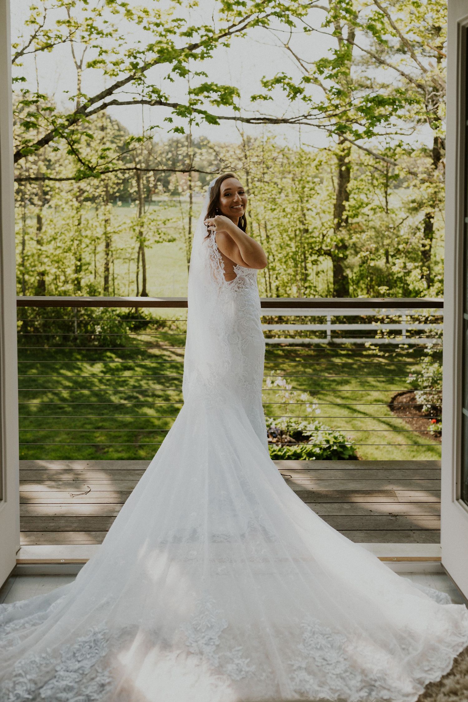 Bride, Chrissy, posing for a bridal portrait before the wedding ceremony