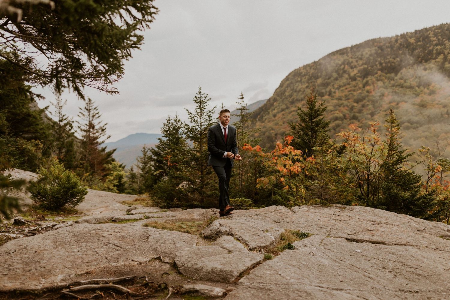 Groom approaching the bride on their elopement day to see her in her gown for the first time.