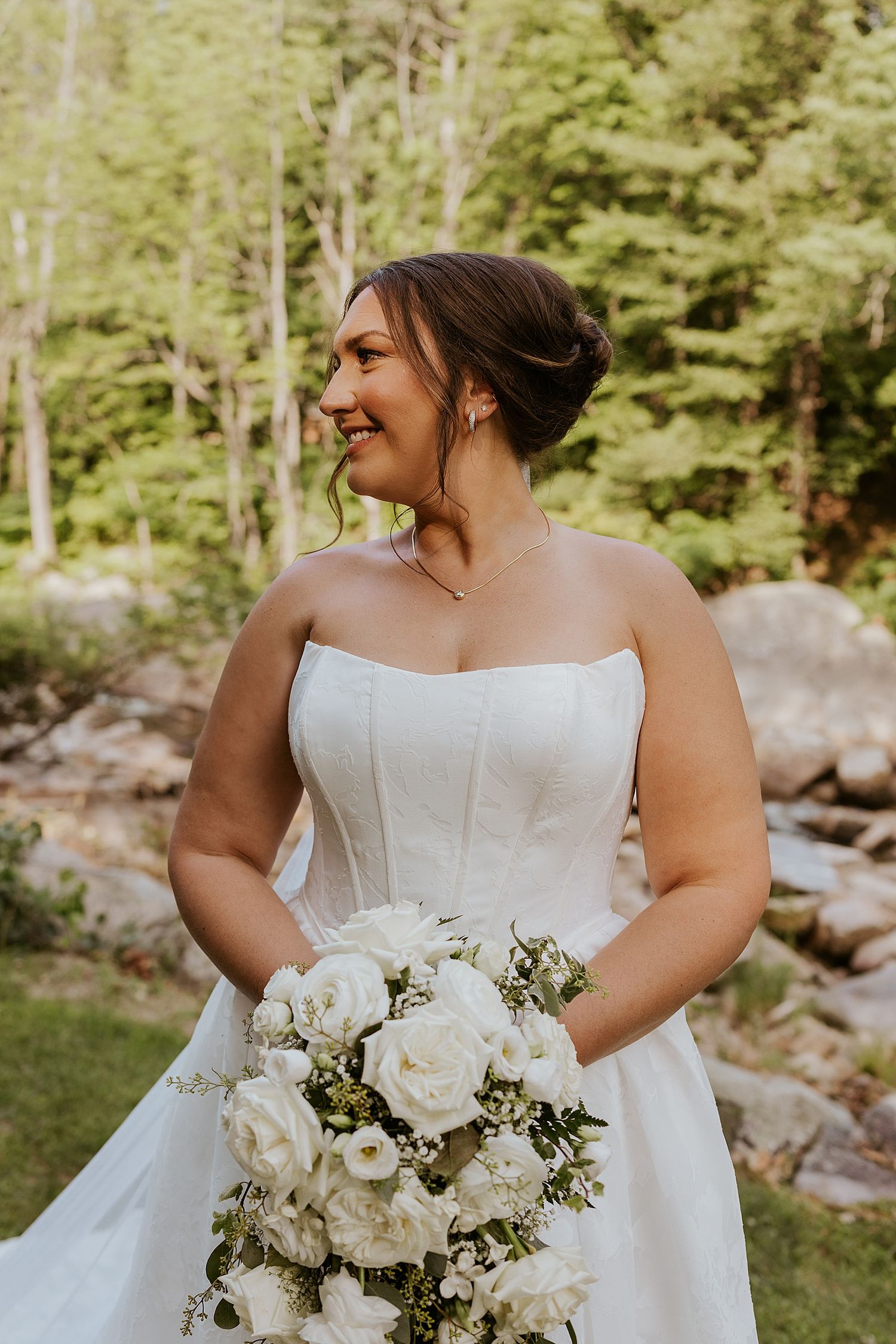 Bride having her portrait taken at her New Hampshire wedding