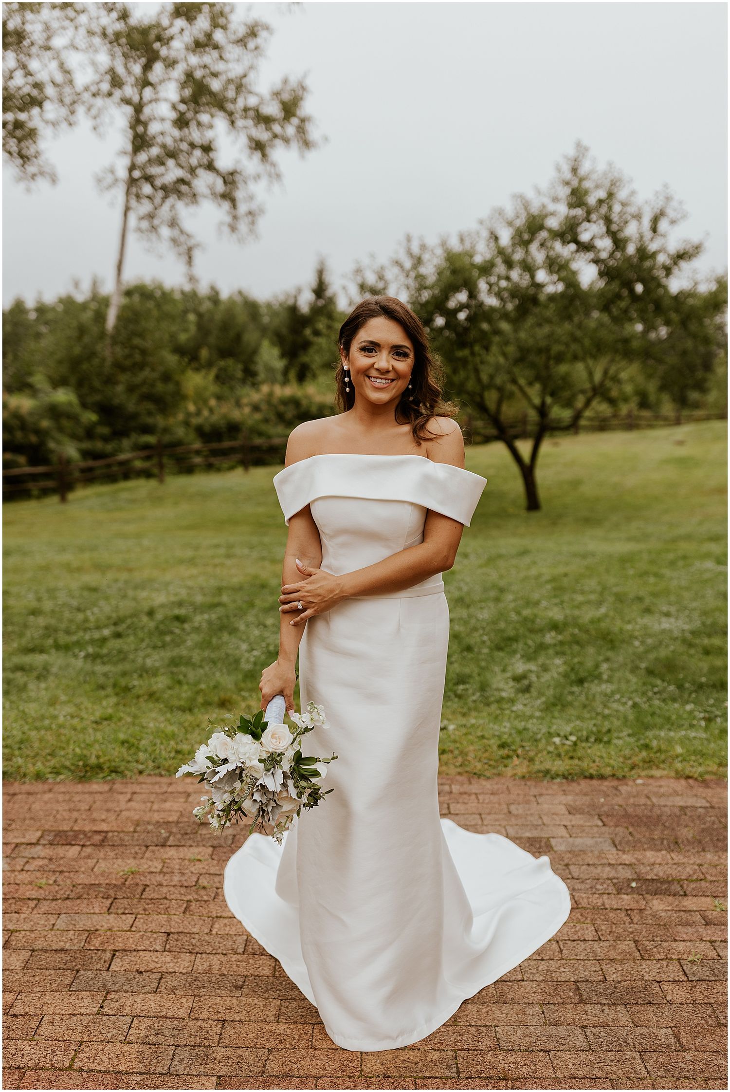 Bride in off the shoulder wedding gown for NH wedding