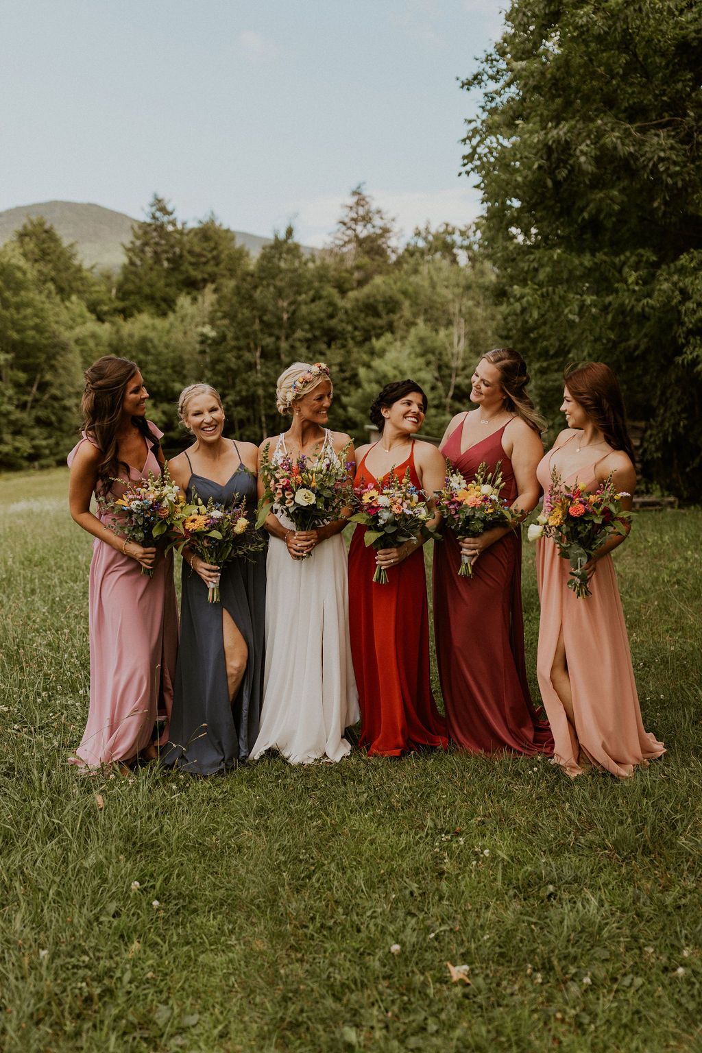 Colorful bridesmaids dresses and bouquets NH wedding