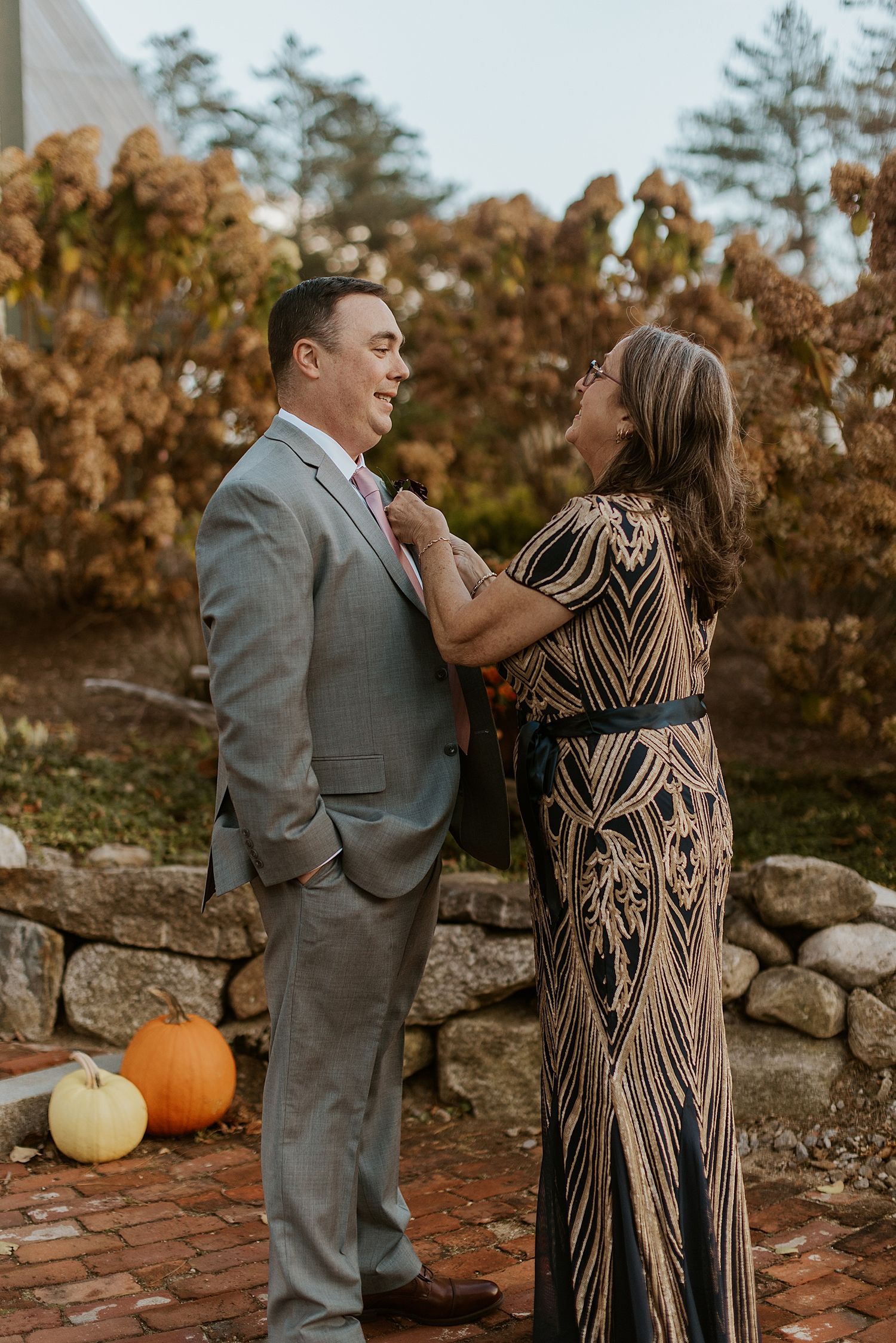 Groom and his mother getting ready for his New Hampshire wedding