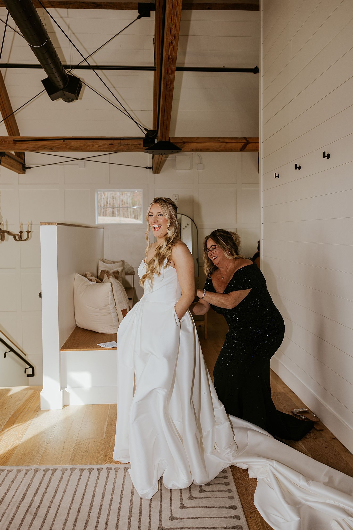 Bride getting dressed for her NH wedding at Hyla Brook Estate