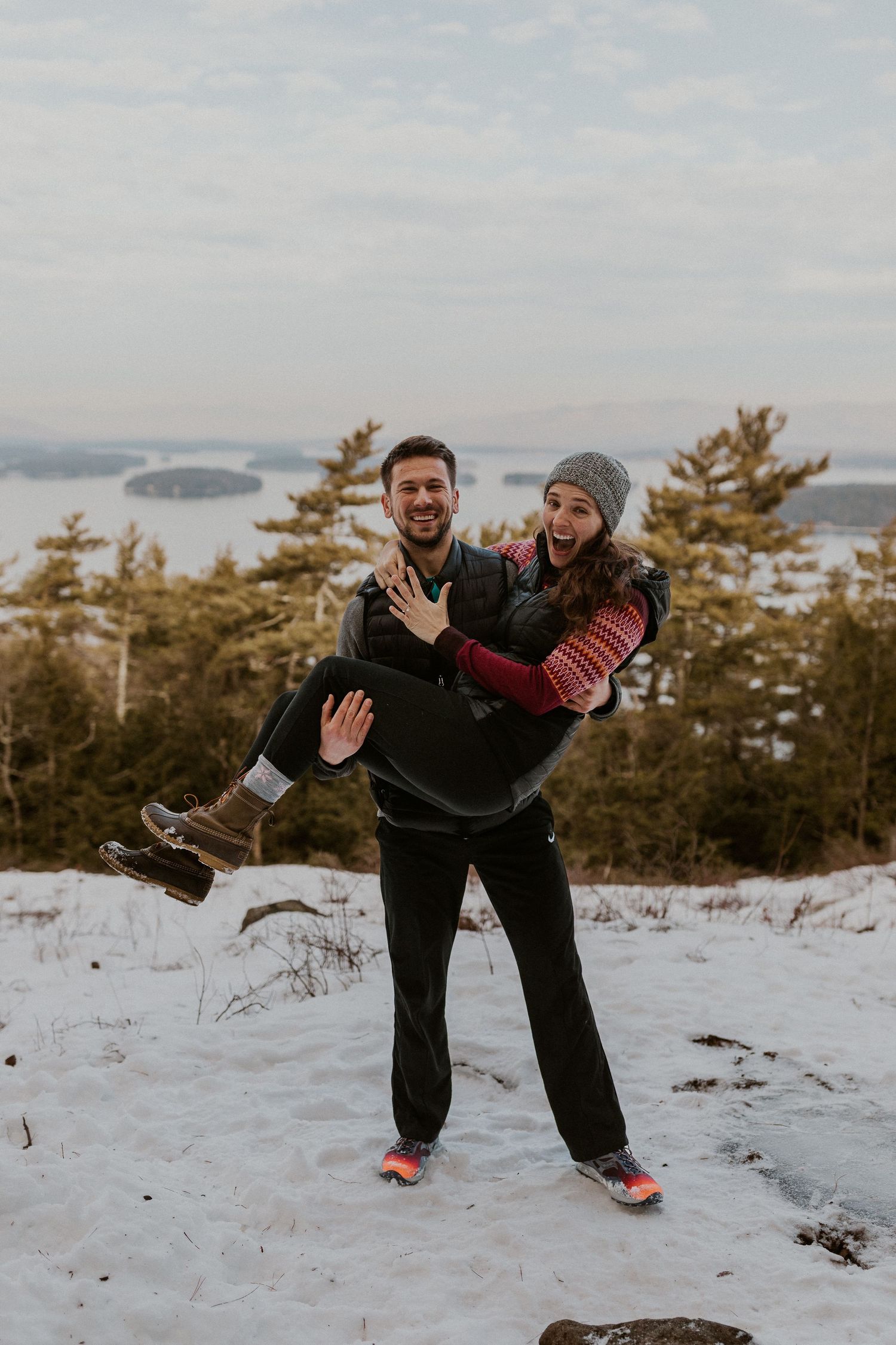 Kirsten and Ivan playfully showing off their new engagement with a celebratory photoshoot!
