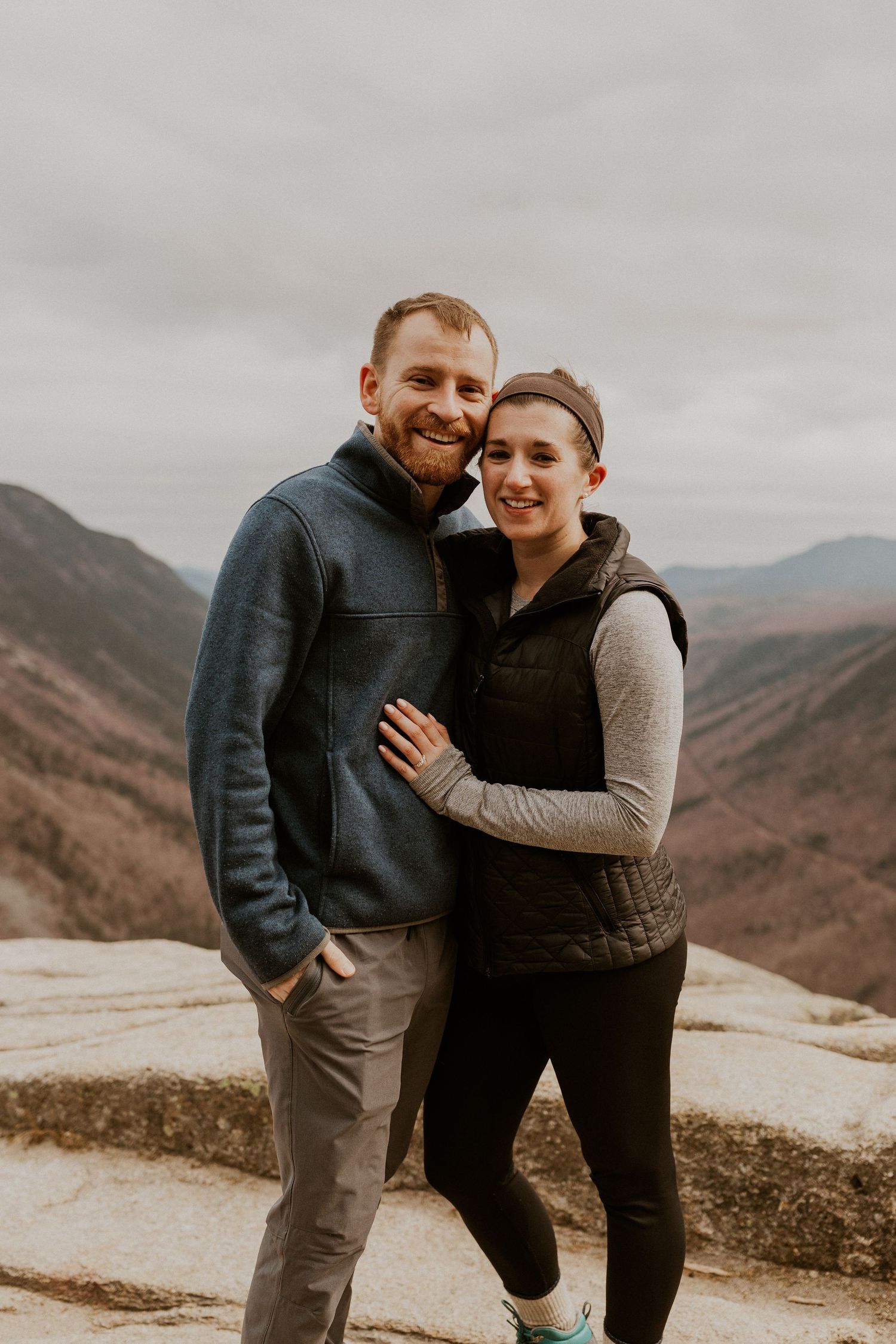 Celebratory engagement photos on top of Mount Willard.