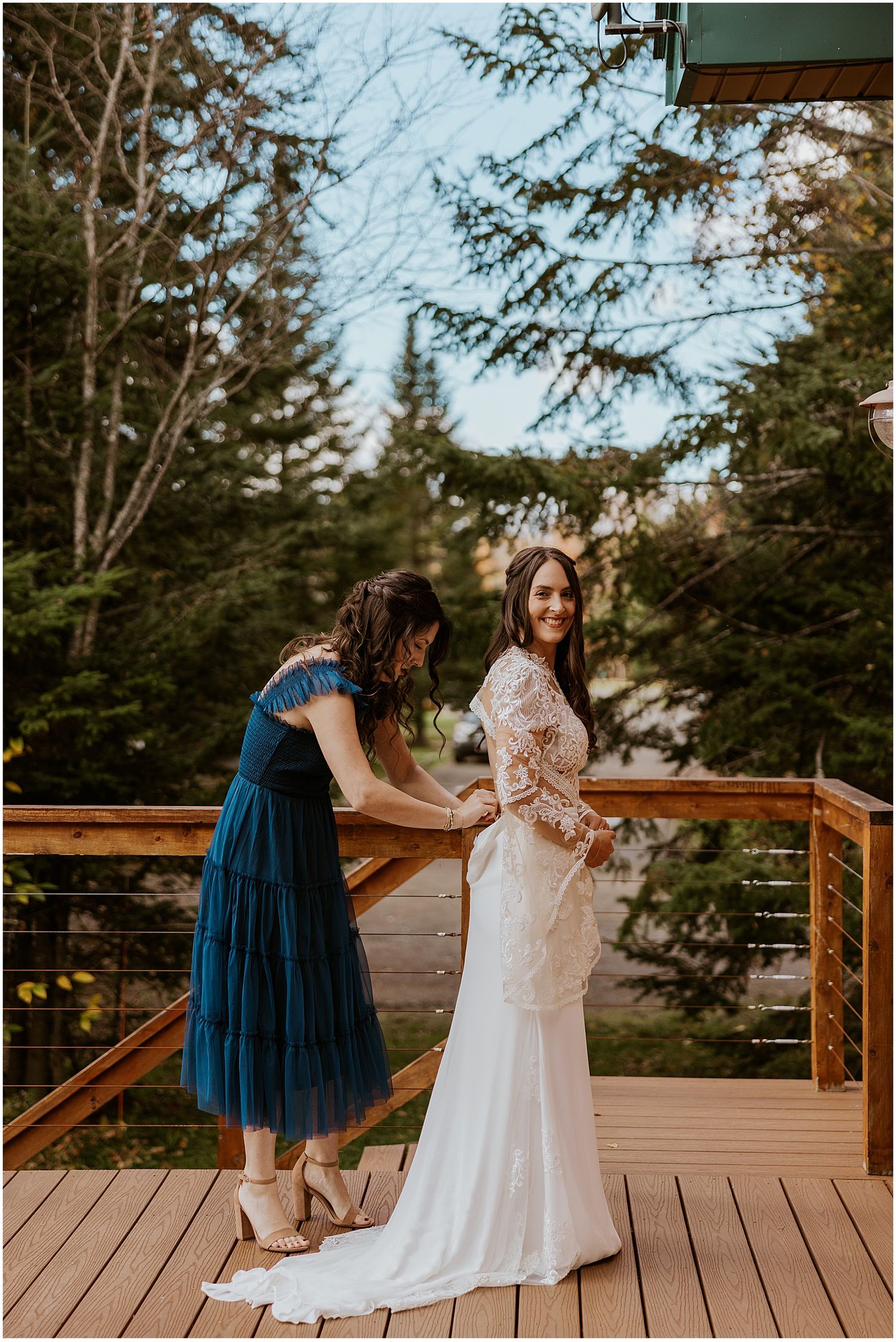 Bride getting ready for her NH wedding in nature Robin Easler Photo