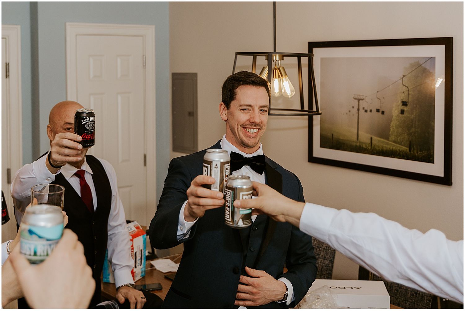 Groom getting ready with his groomsmen at River Walk Resort