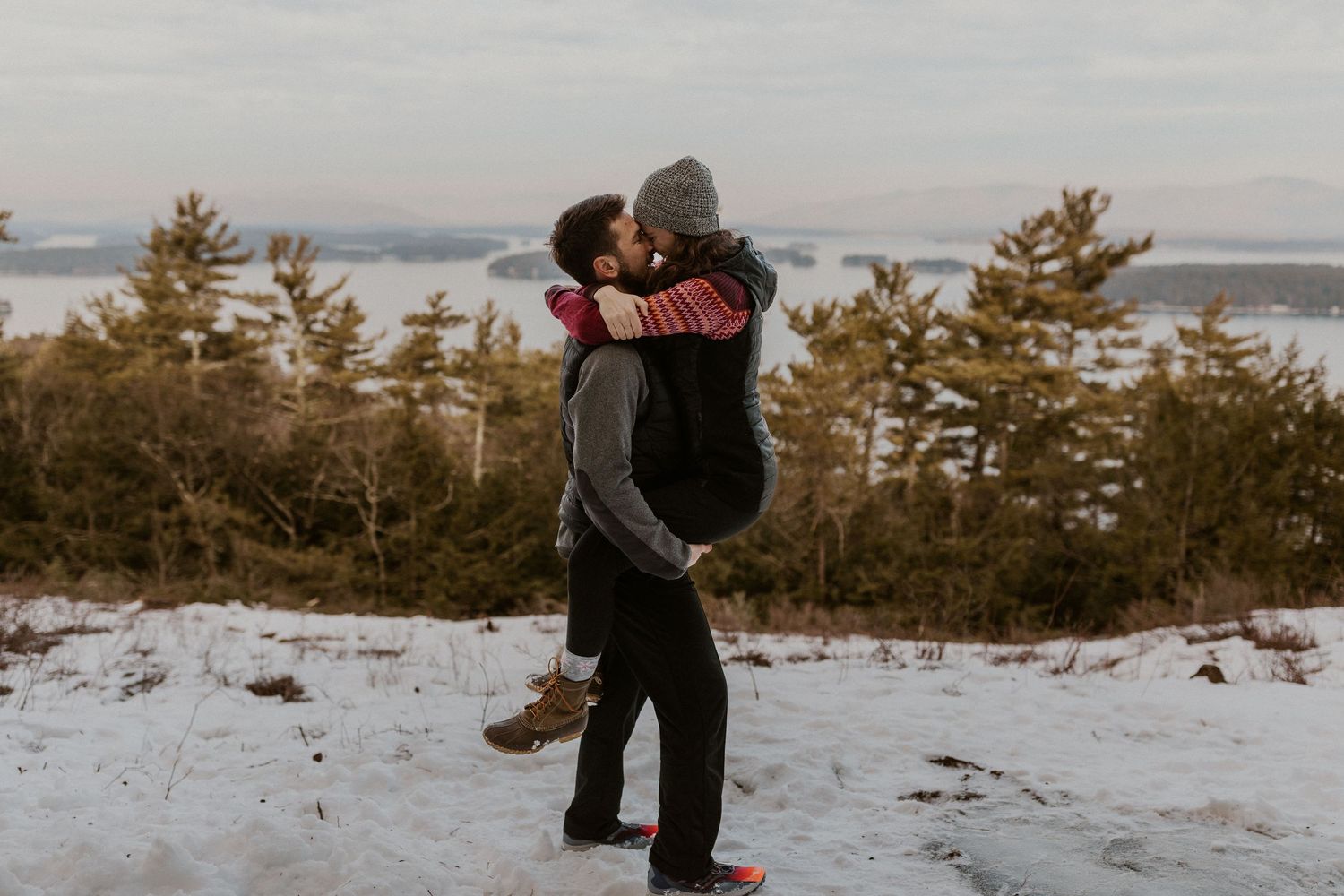 Kirsten and Ivan playfully showing off their new engagement with a celebratory photoshoot!