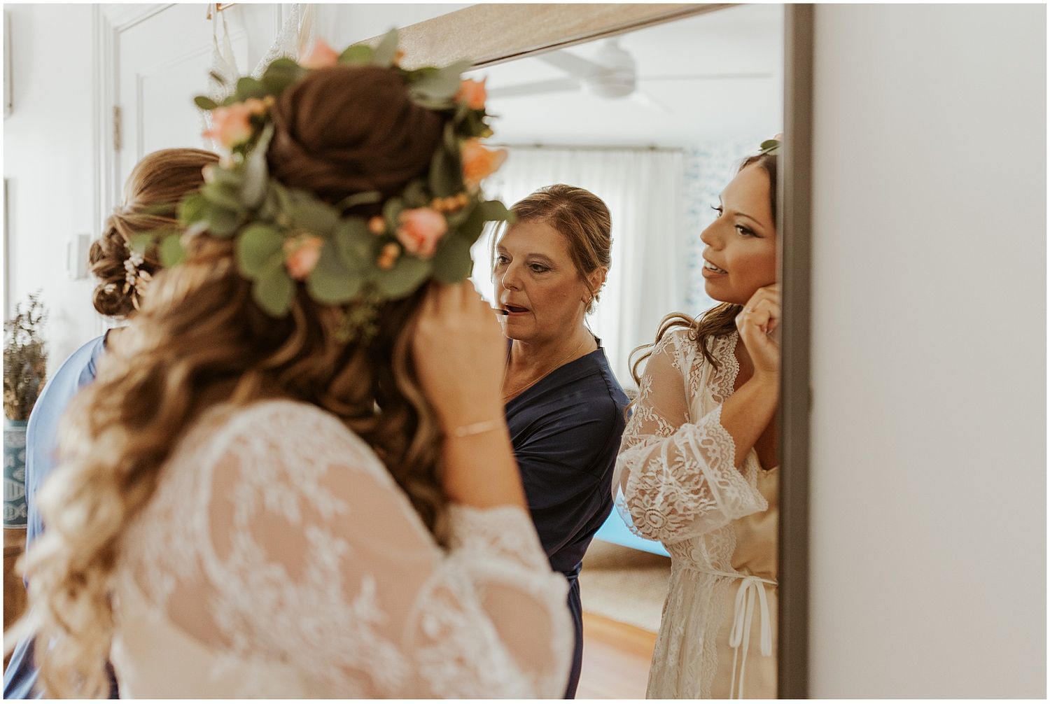 Getting ready photos of bride putting on her jewelry
