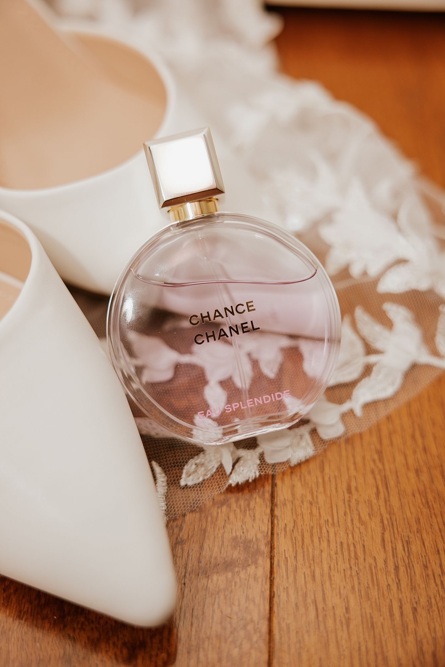 Bridal details including bridal shoes and chanel perfume for a New Hampshire wedding
