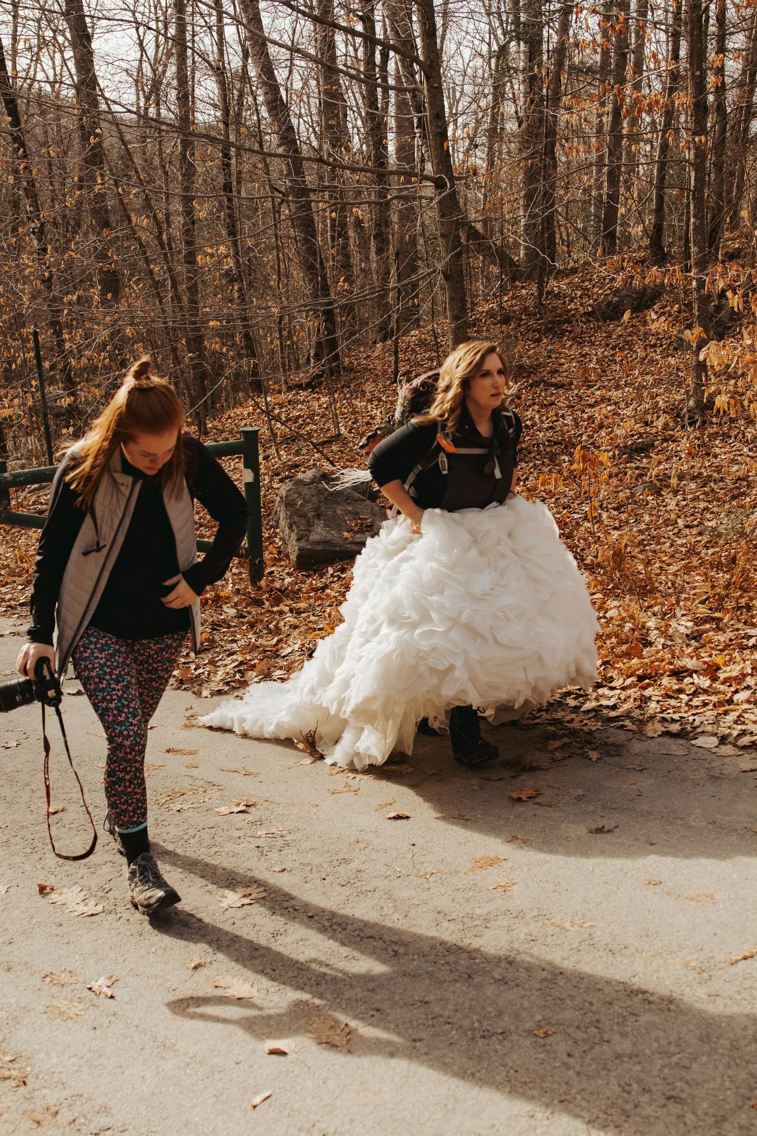 Jackie Brosonski and Robin Easler walking toward the NH Chronicle crew on Mount Cardigan