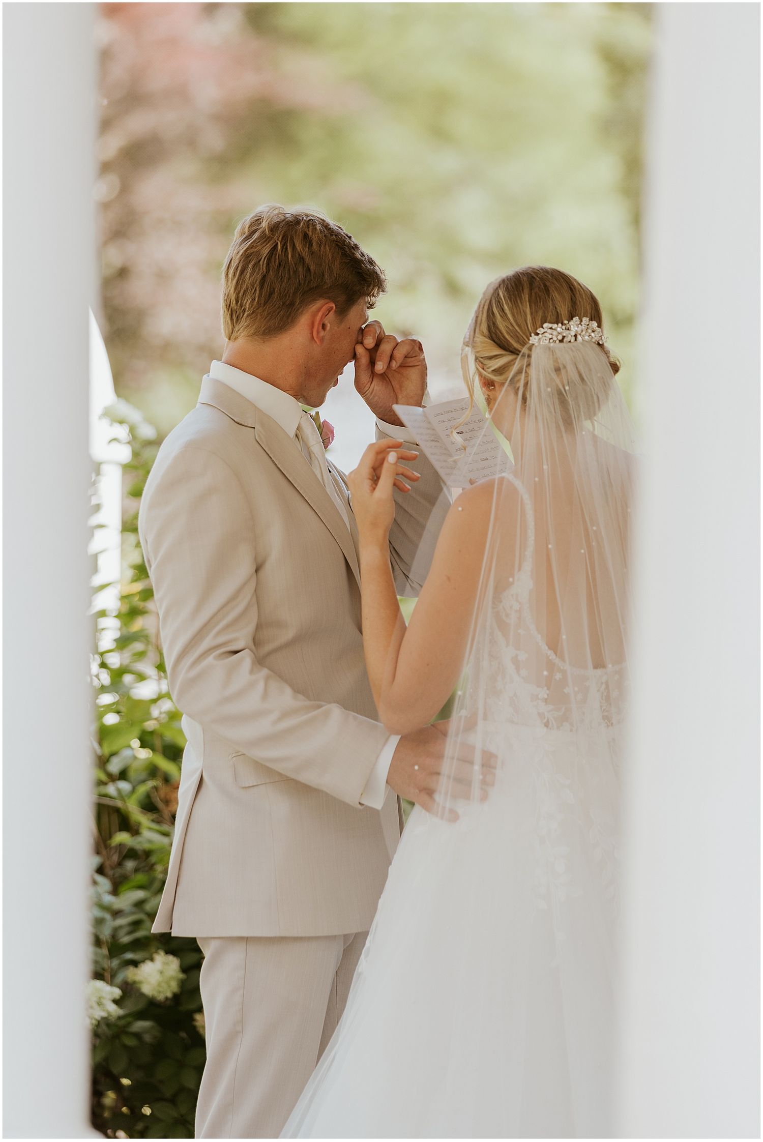 Bride and groom having their first look at the Winthrop Carter House