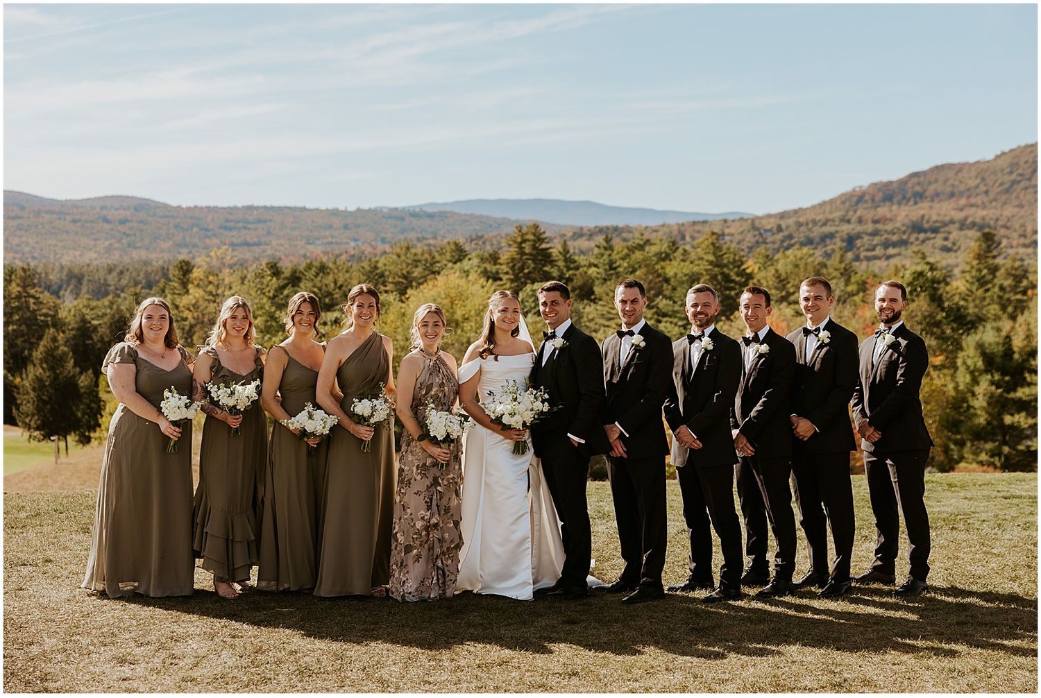 Bride and groom with their wedding party at a White Mountain wedding