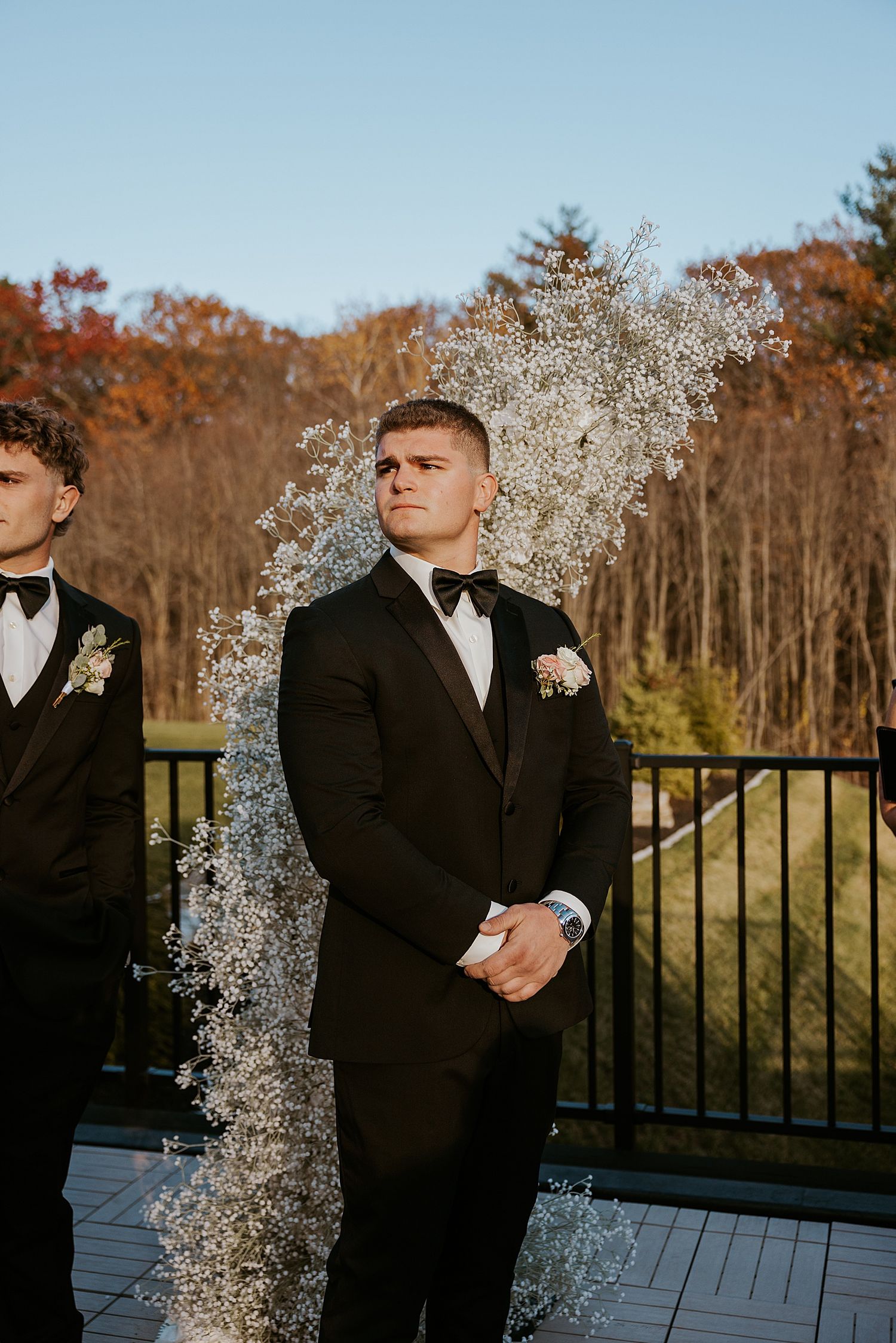 Groom watching his bride walk down the aisle at Hyla Brook Estate in NH