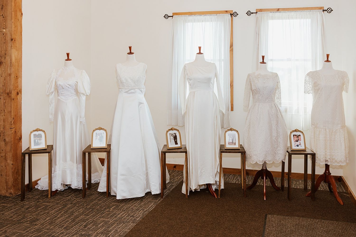Vintage wedding gowns on display at a New Hampshire wedding reception at Dell-Lea