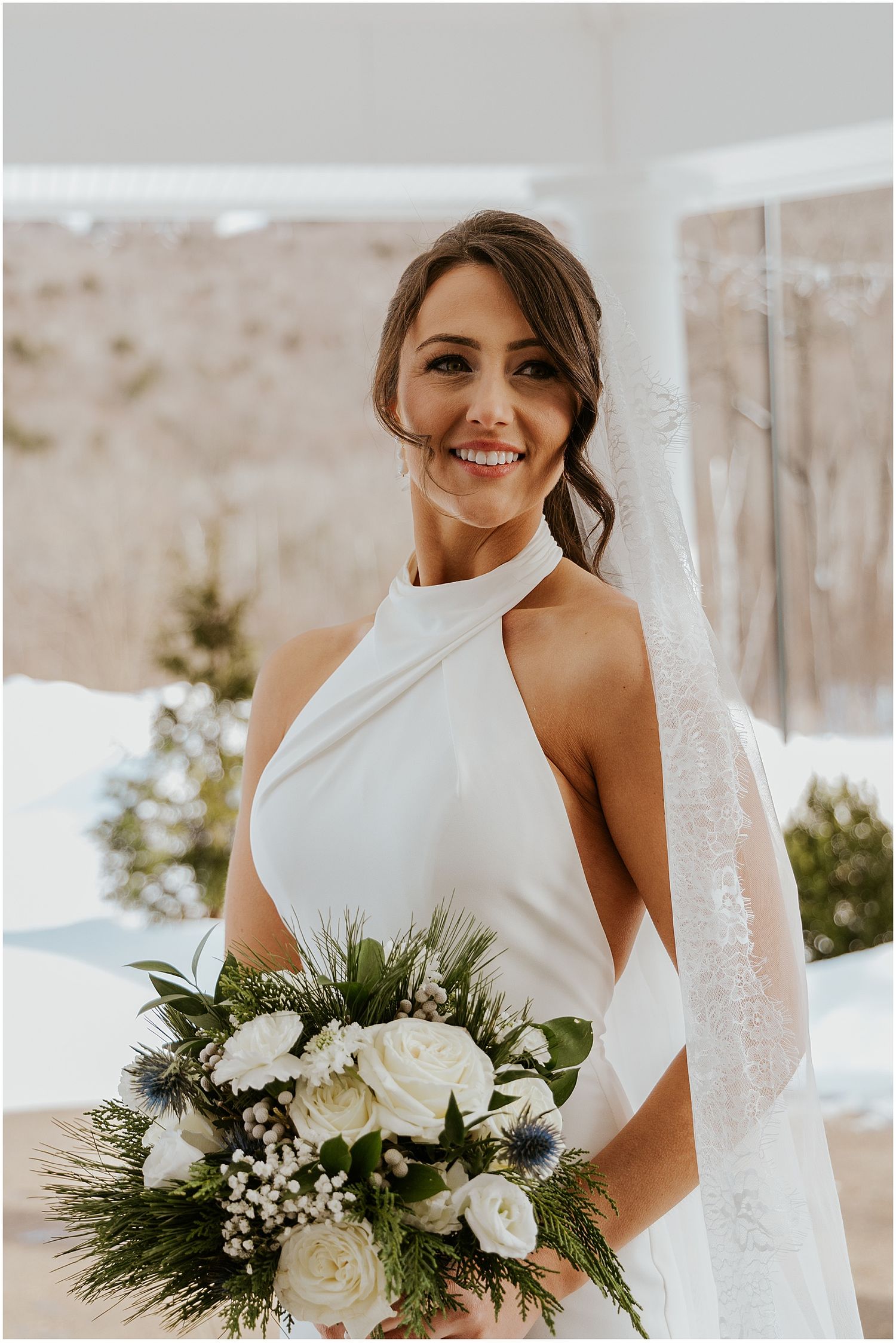 Bride taking portrait photos at her Loon Mountain wedding at the River Walk Resort