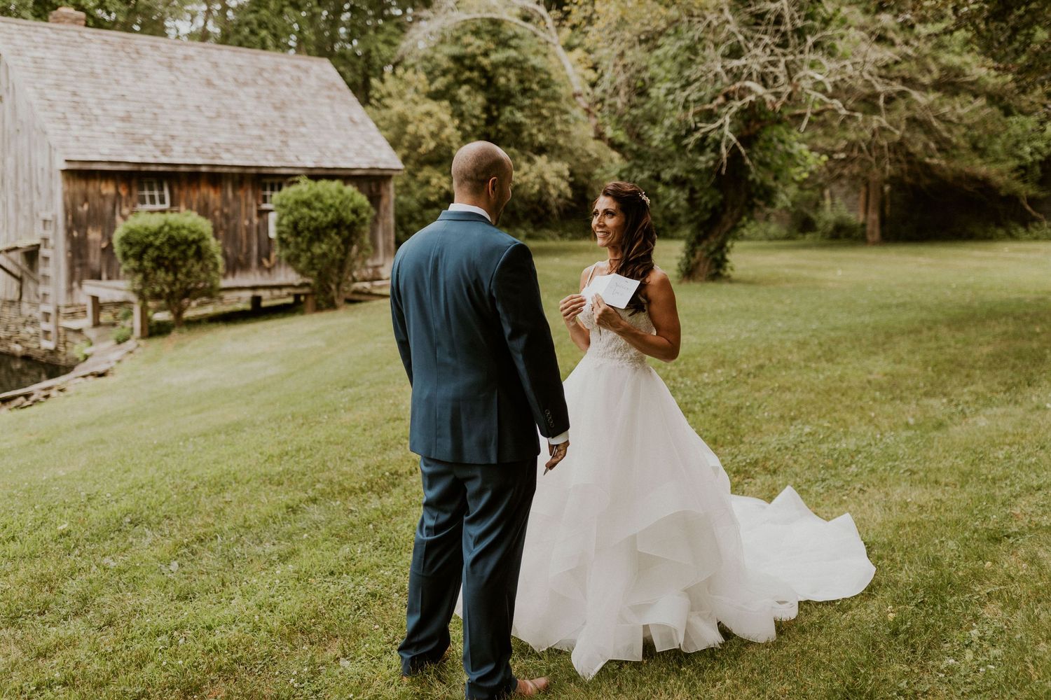 Jessica reading her vows to Mike just after they had a first look together.