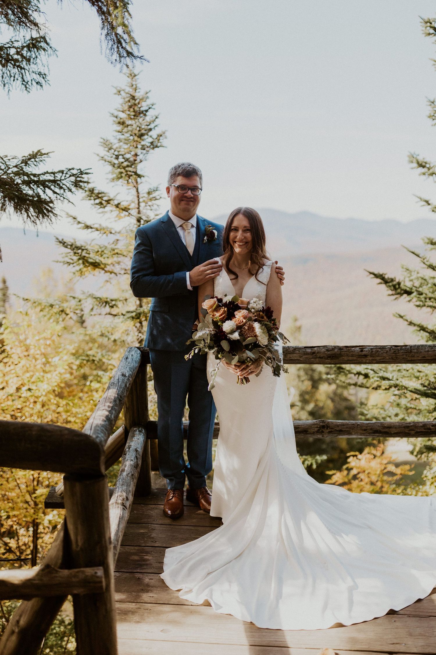 Portraits of the newlyweds on top of Loon Mountain after their fall wedding ceremony.