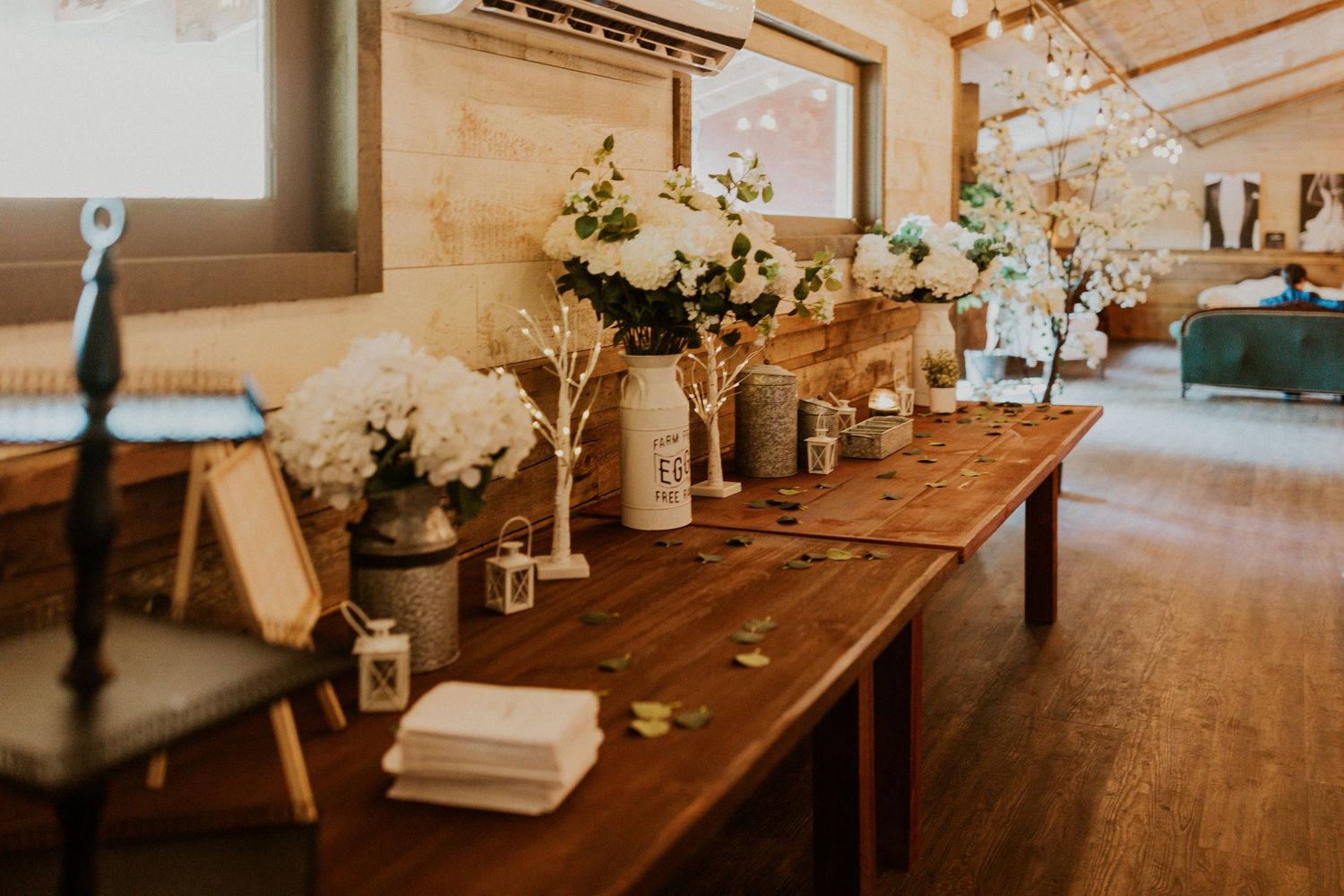 Wedding decor at a rustic barn wedding at the Arabella Estate in Buxton Maine.