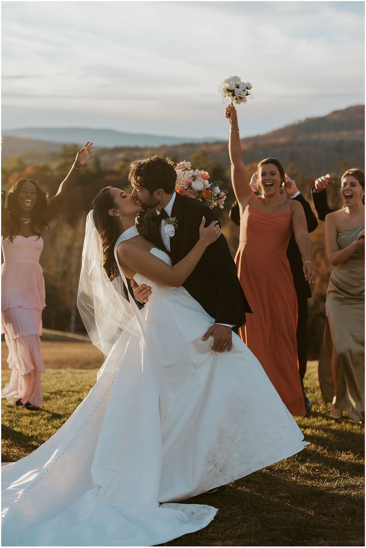 Bride and groom with their wedding party at the Owl's Nest Resort in the White Mountains NH