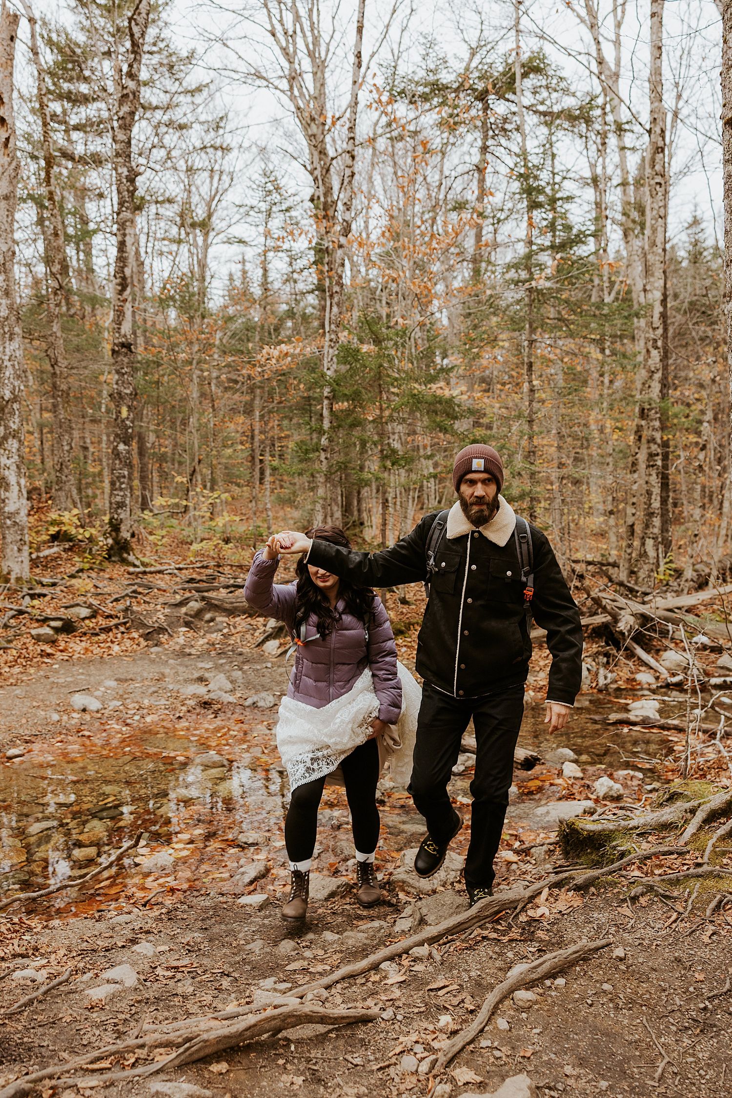 Couple hiking to elope in the White Mountains in New Hampshire