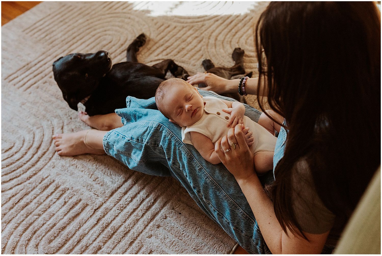New Hampshire mom taking newborn family photos with her new baby and dog