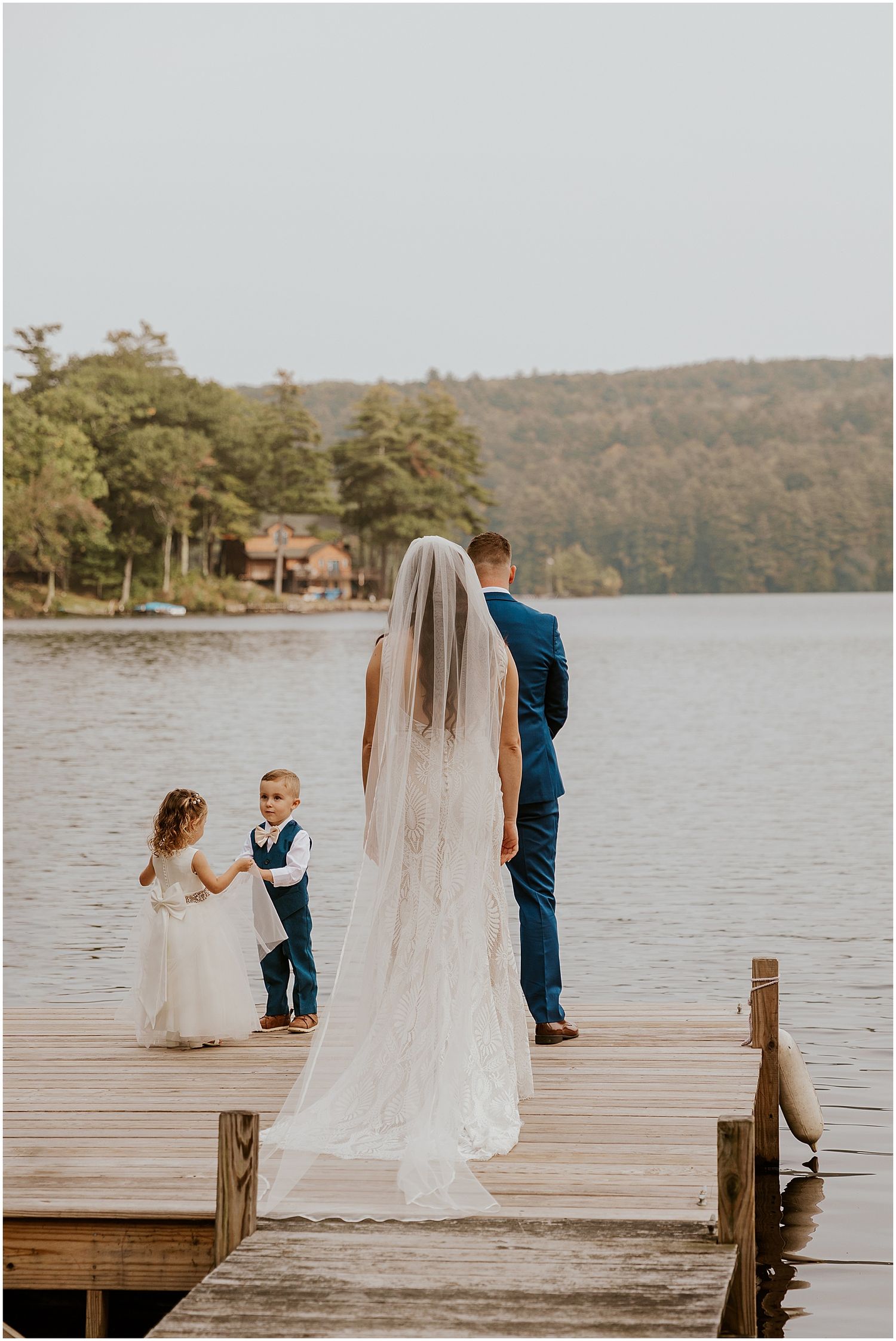 Bride and groom first look NH lake wedding