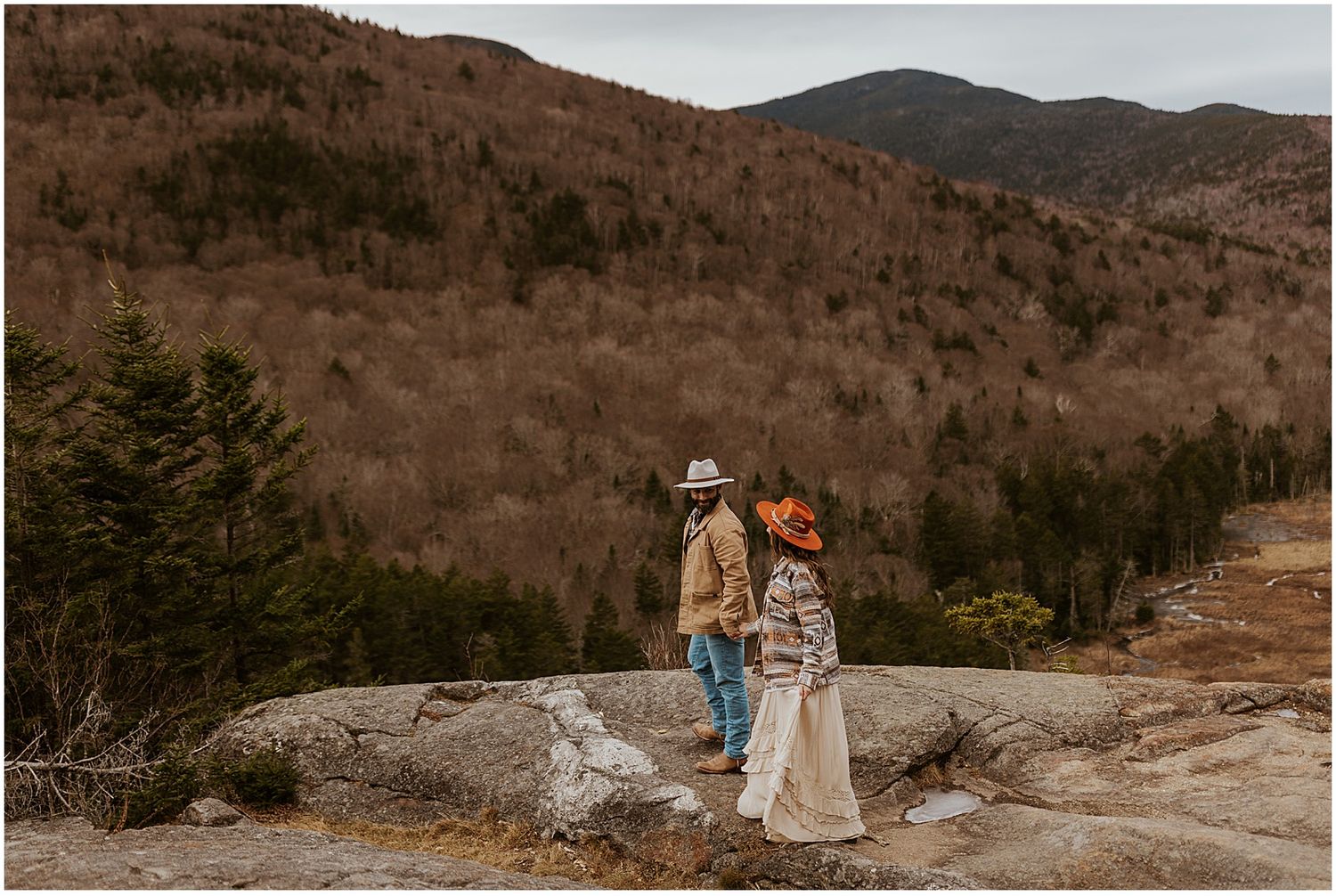 NH couple taking engagement photos in the White Mountains