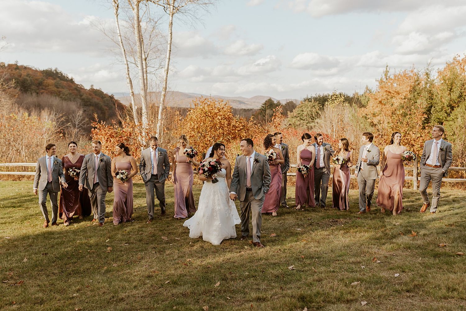 Couple taking photos with their wedding party as part of their wedding photo list