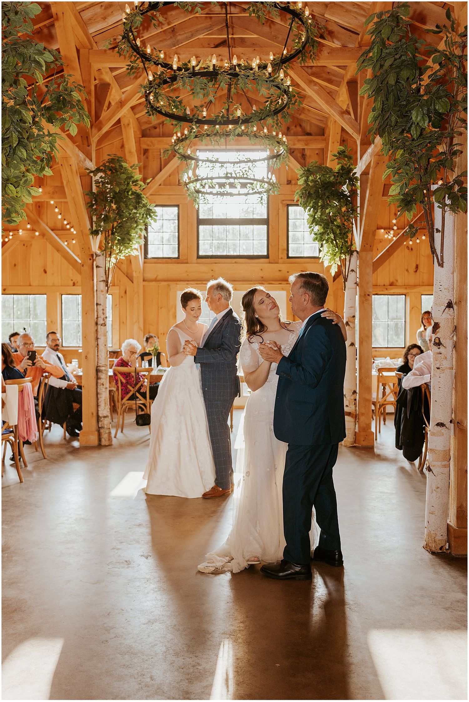 Brides dancing with their fathers at their wedding reception in New Hampshire