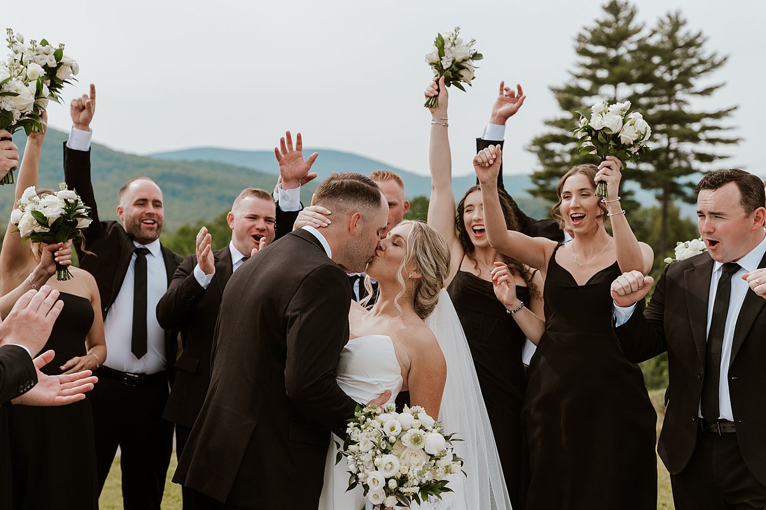 NH bride and groom with their wedding party at an Owl's Nest Resort wedding