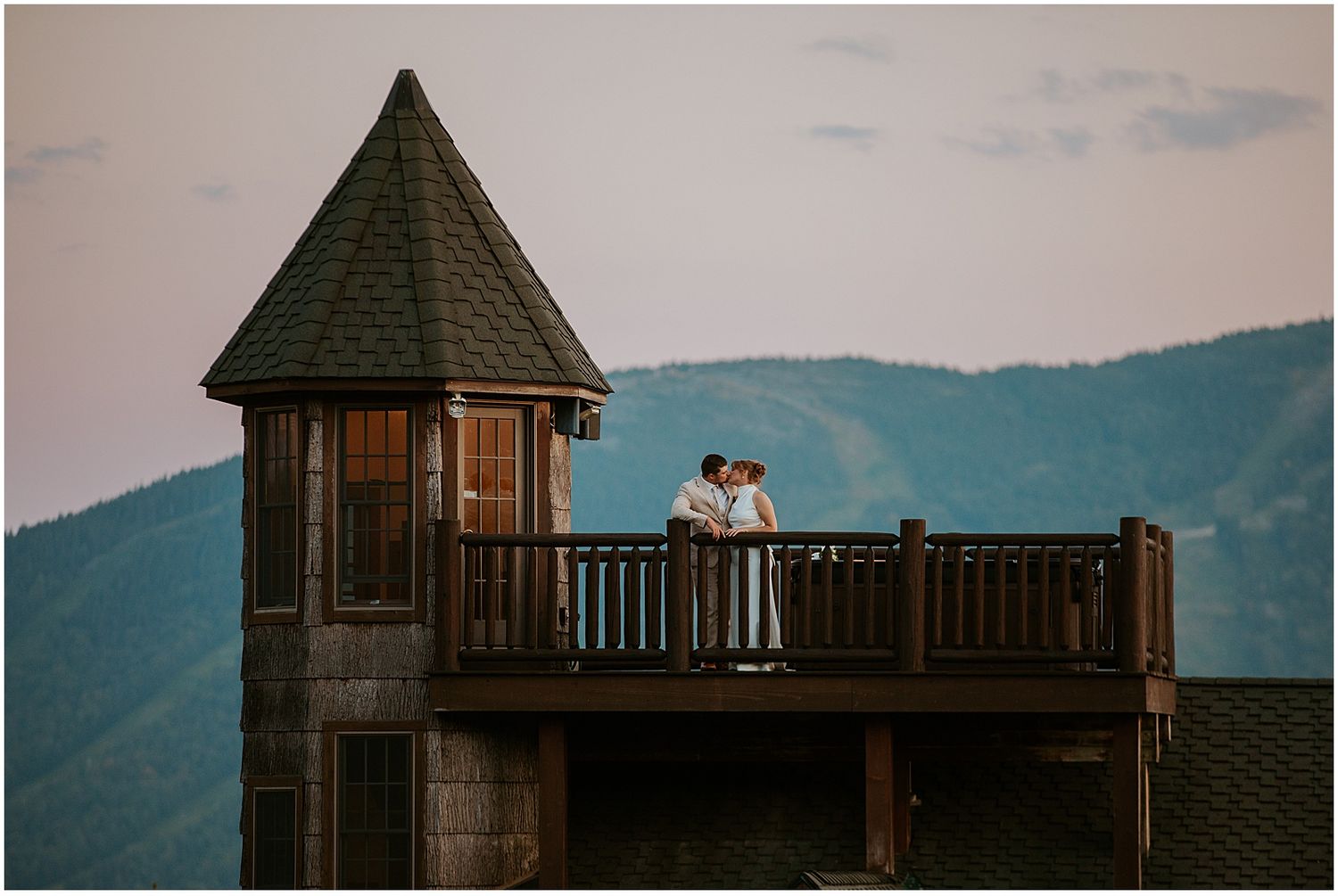 Bride and groom on the rooftop deck at their VRBO Maine wedding