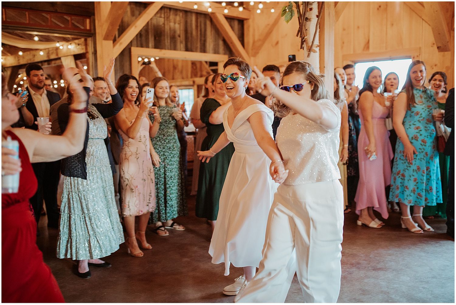 Brides making their entrance to their wedding reception in New Hampshire