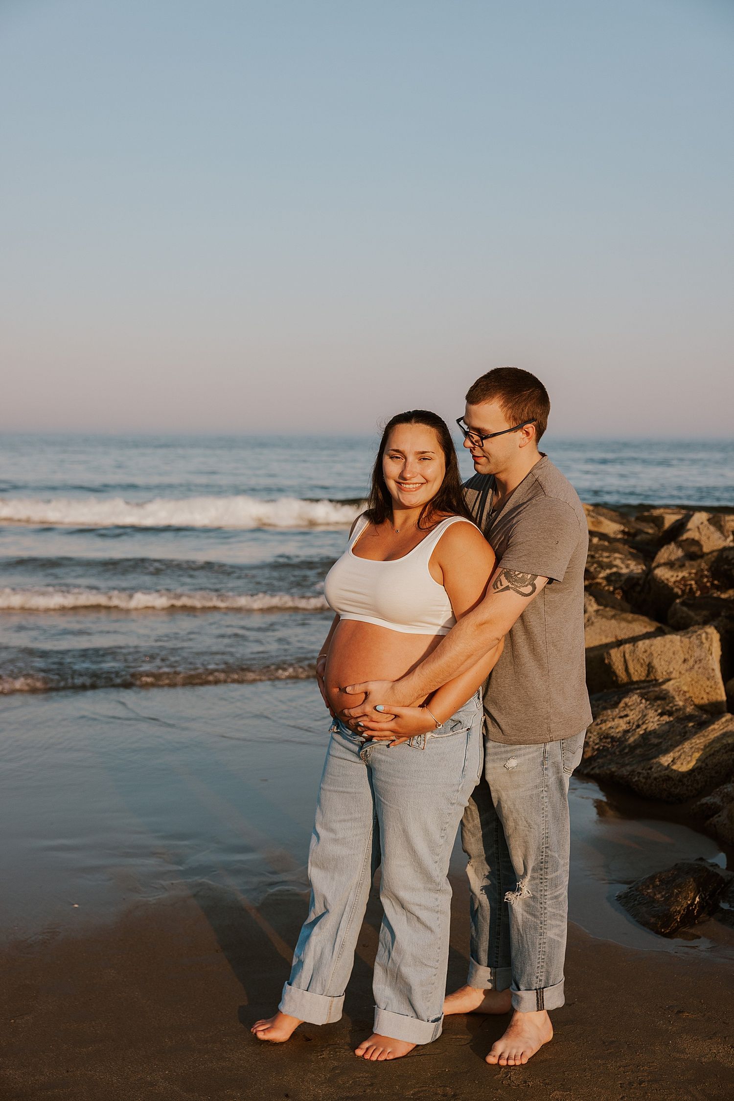 New Hampshire couple taking maternity pictures at Rye Beach sharing maternity photo session tips