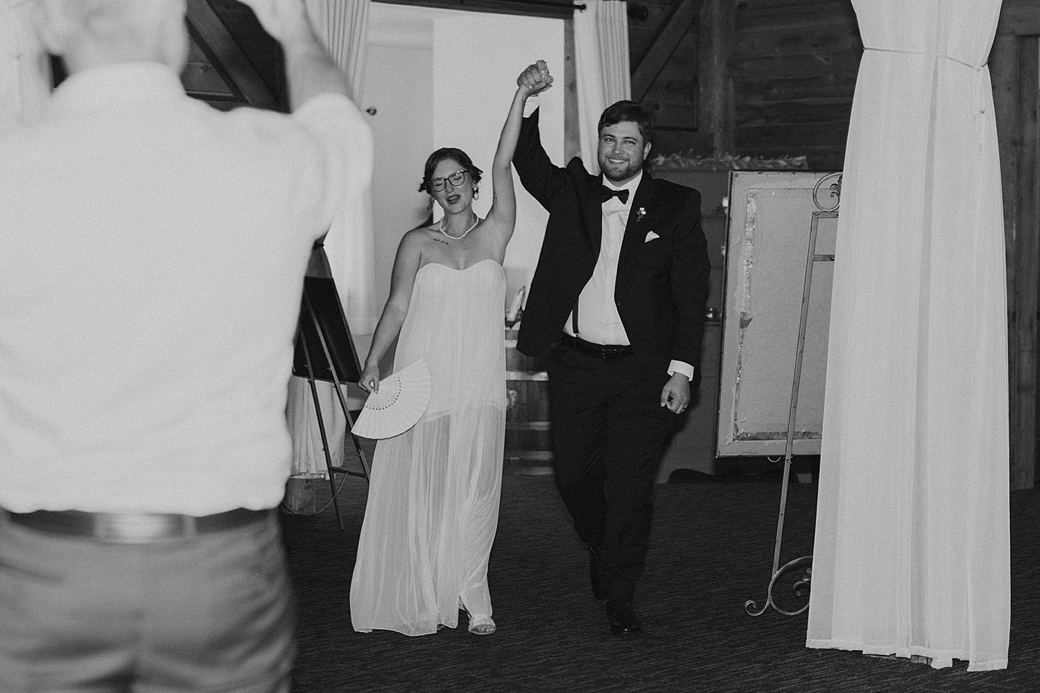 Bride and groom making their grand entrance to their New Hampshire wedding at Dell-Lea