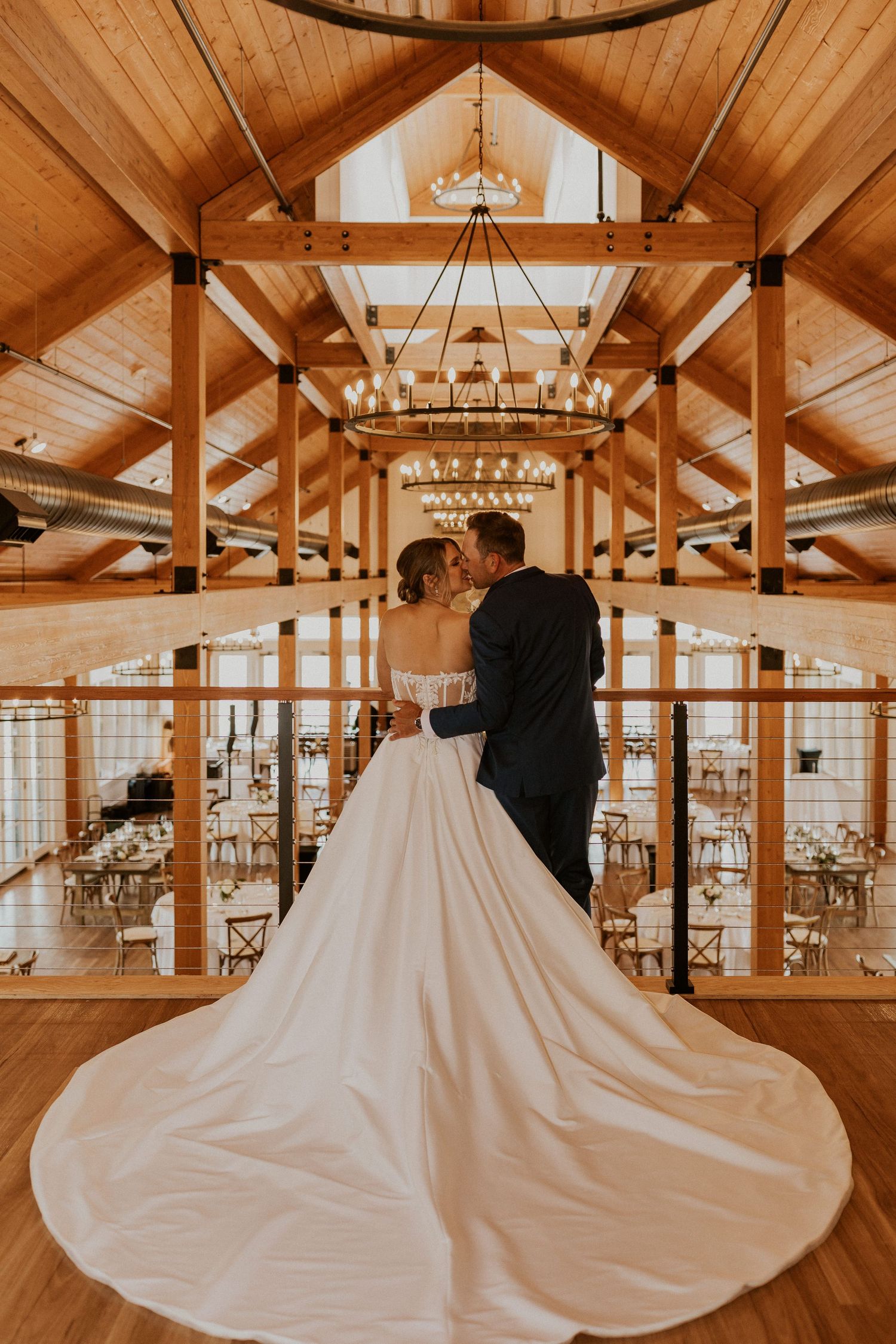 Kendra and Andrew looking at their wedding reception space as all of the final details come together before guests arriv