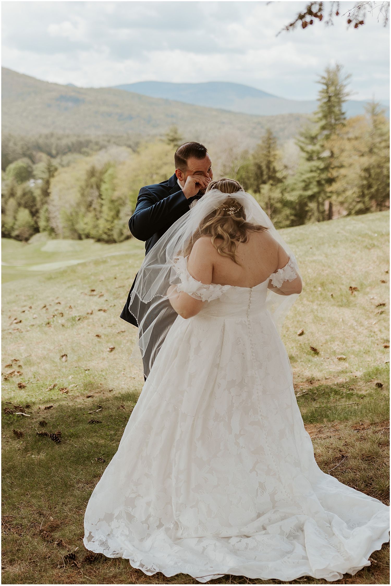 Bride and groom frist look at NH mountain wedding