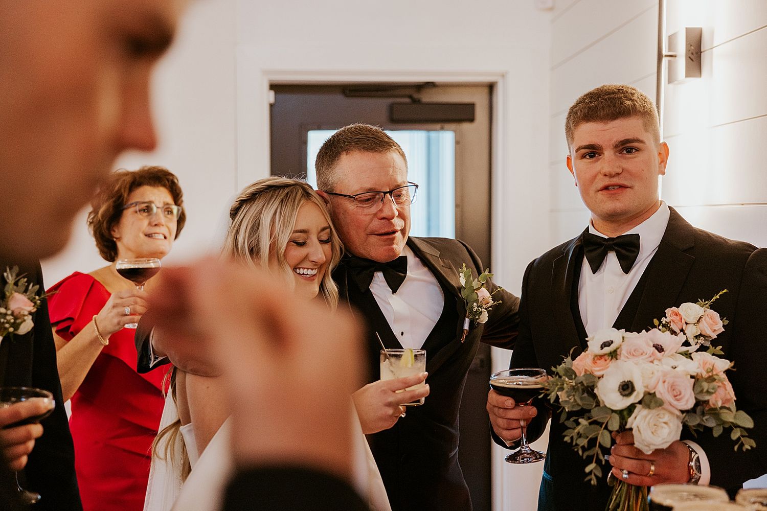 Bride and groom mingling with guests after their ceremony at Hyla Brook Estate in NH