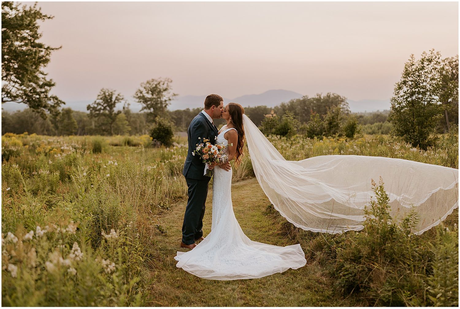 Bride and groom taking golden hour portraits at their Whiteface Hollow wedding in the White Mountains of New Hampshire