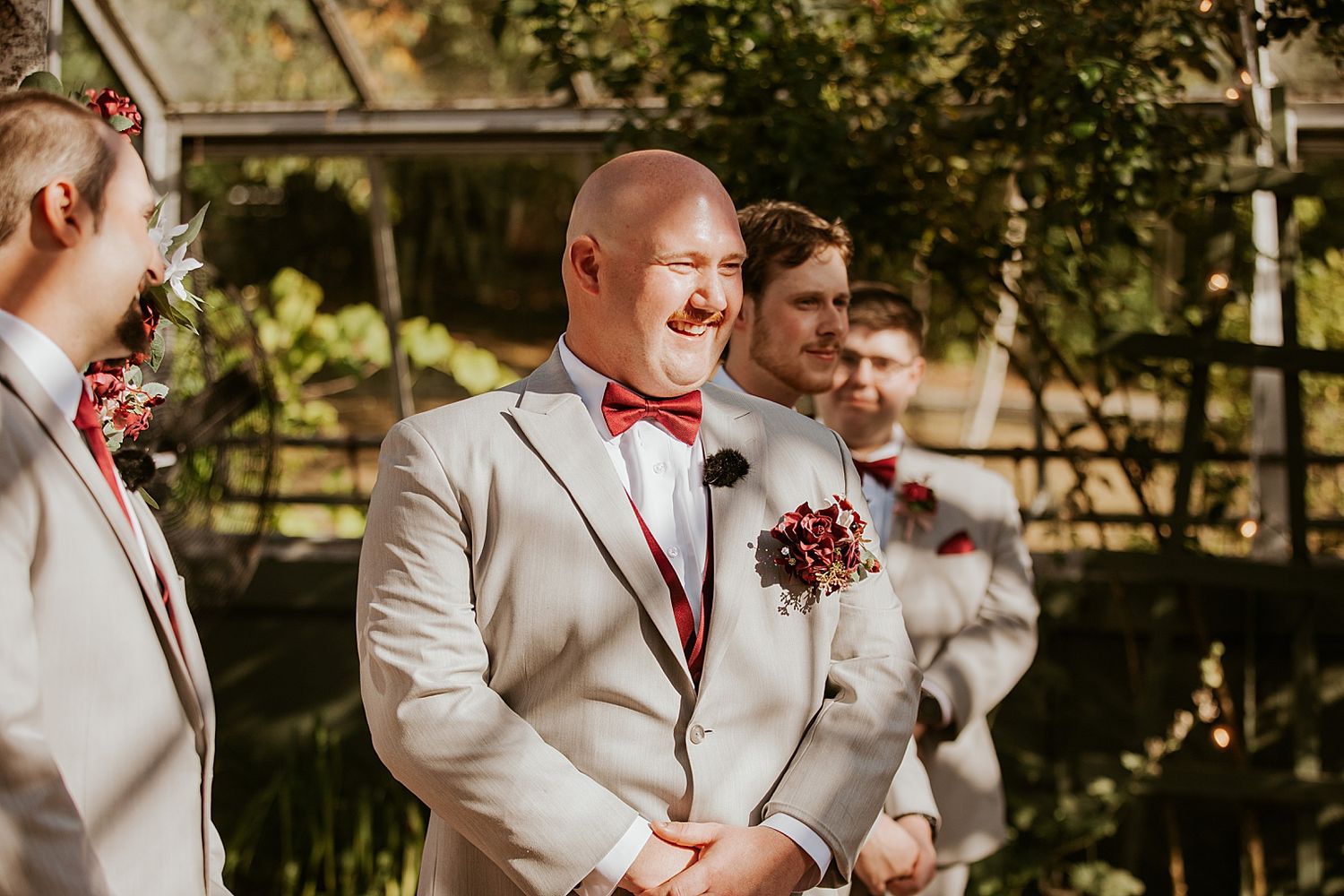 Groom waiting for his bride to walk down the aisle at their New Hampshire wedding