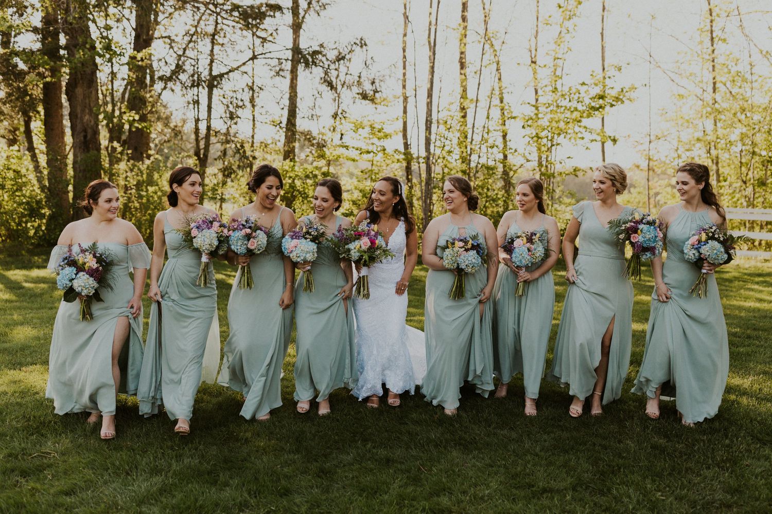 Bridesmaid group photos, everyone is talking and laughing and enjoying themselves.