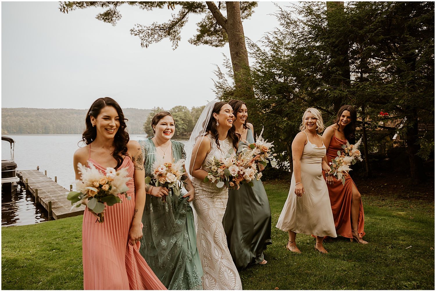 Bride and her bridesmaids at a Lakeshore Village Resort outdoor wedding