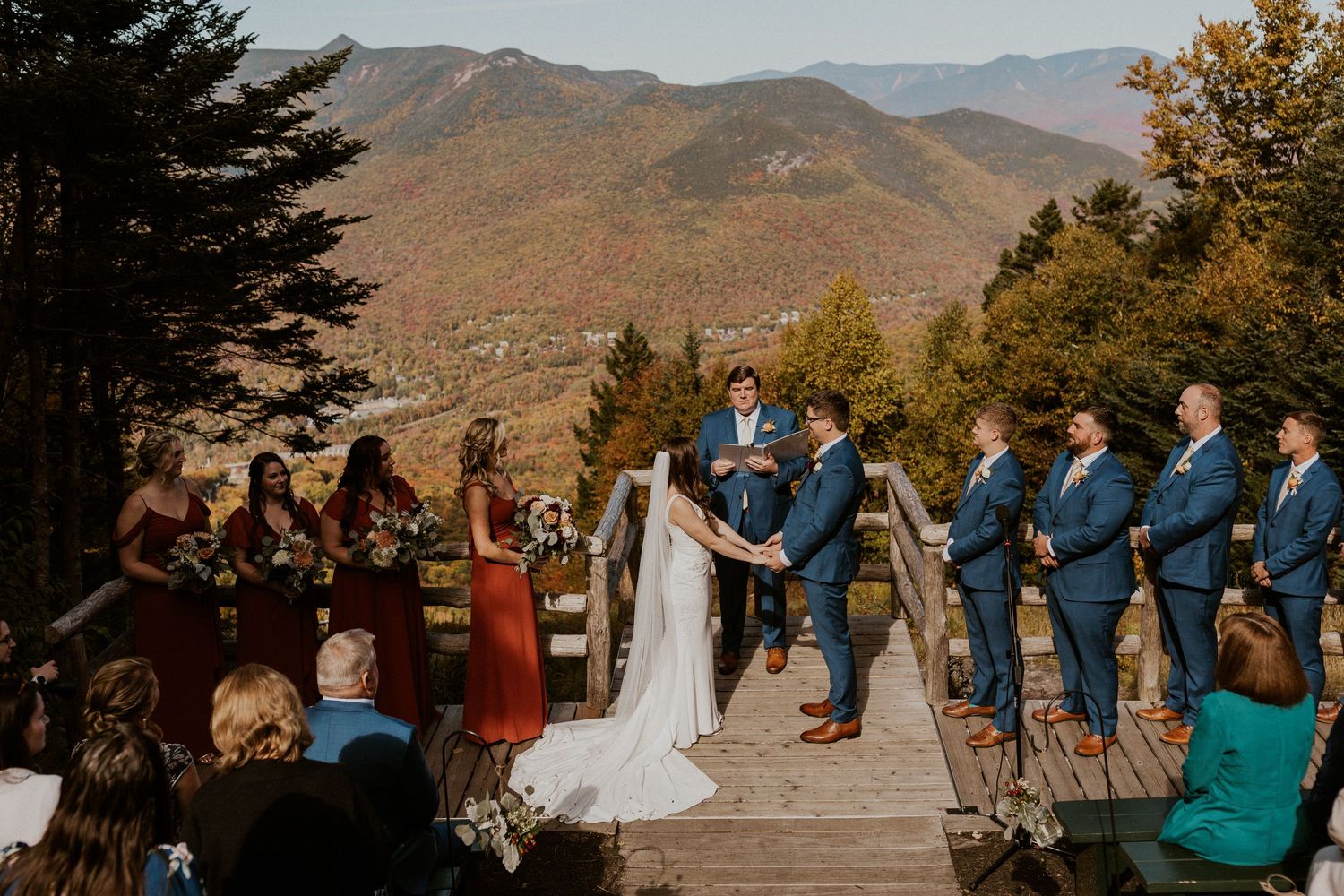 Mountaintop wedding ceremony during peak foliage in Lincoln New Hampshire.