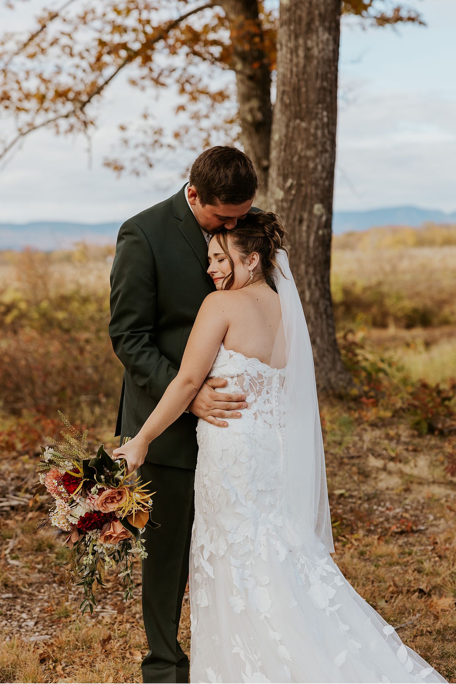 Bride and groom taking first look wedding photos at their wedding in Maine