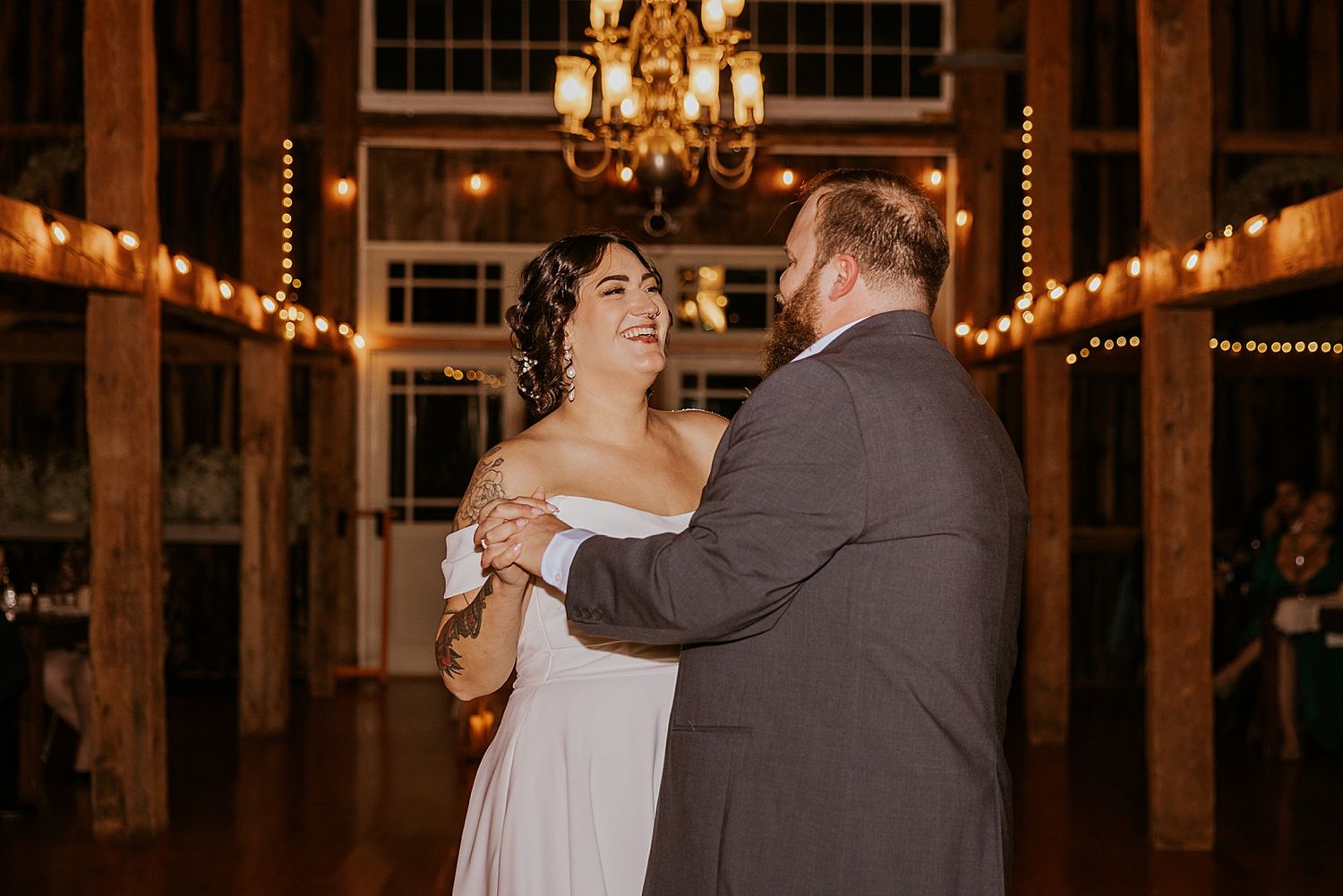 Couple having their first dance at their NH wedding at the Barn at Powder Major's Farm